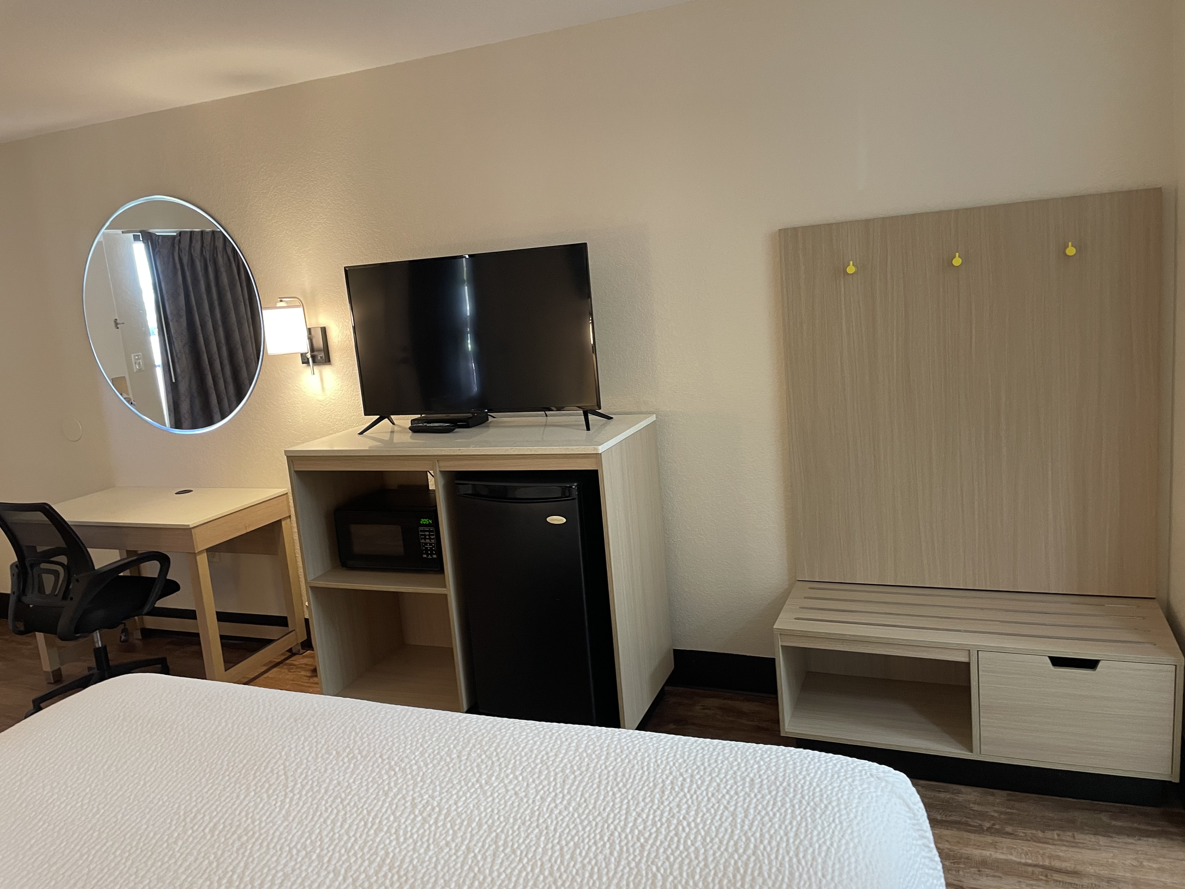 Guest room at the Days Inn & Suites by Wyndham Navarre - near Beaches/Hurlburt in Navarre, Florida
