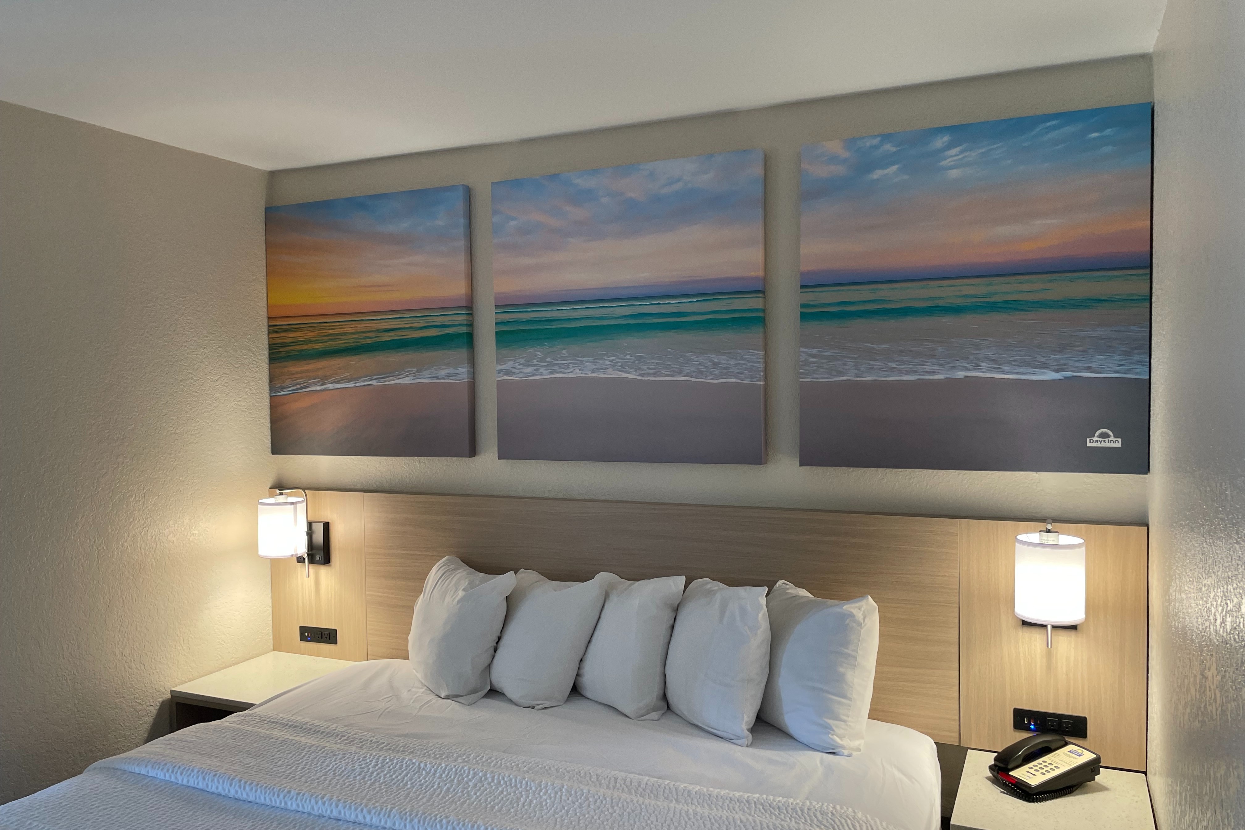 Guest room at the Days Inn & Suites by Wyndham Navarre - near Beaches/Hurlburt in Navarre, Florida