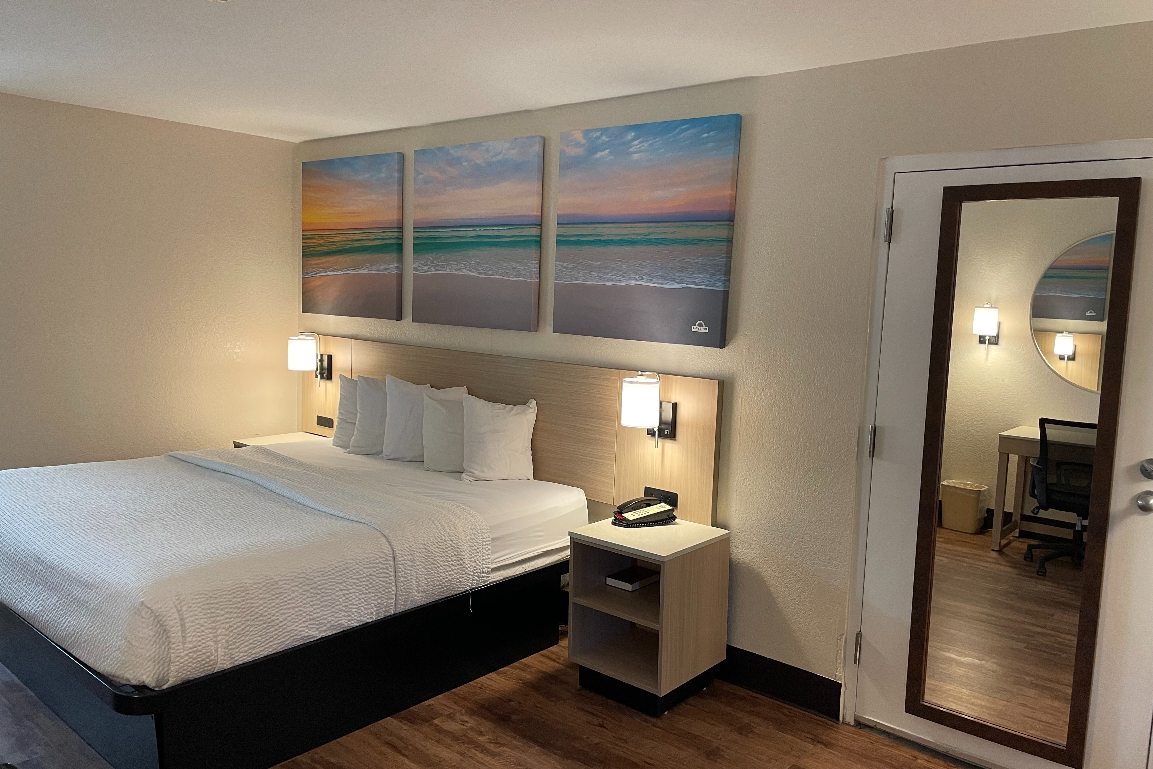 Guest room at the Days Inn & Suites by Wyndham Navarre - near Beaches/Hurlburt in Navarre, Florida