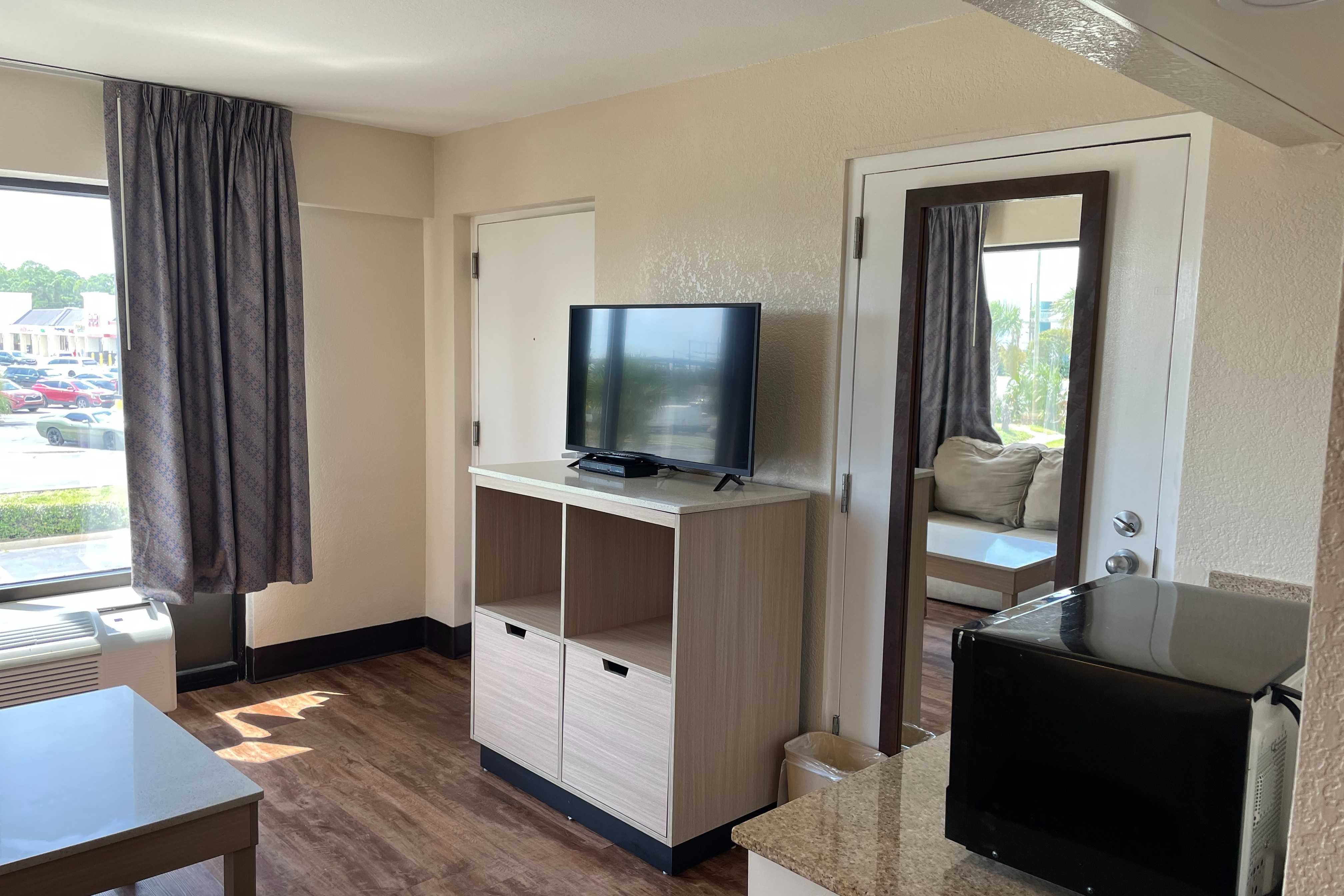 Guest room at the Days Inn & Suites by Wyndham Navarre - near Beaches/Hurlburt in Navarre, Florida