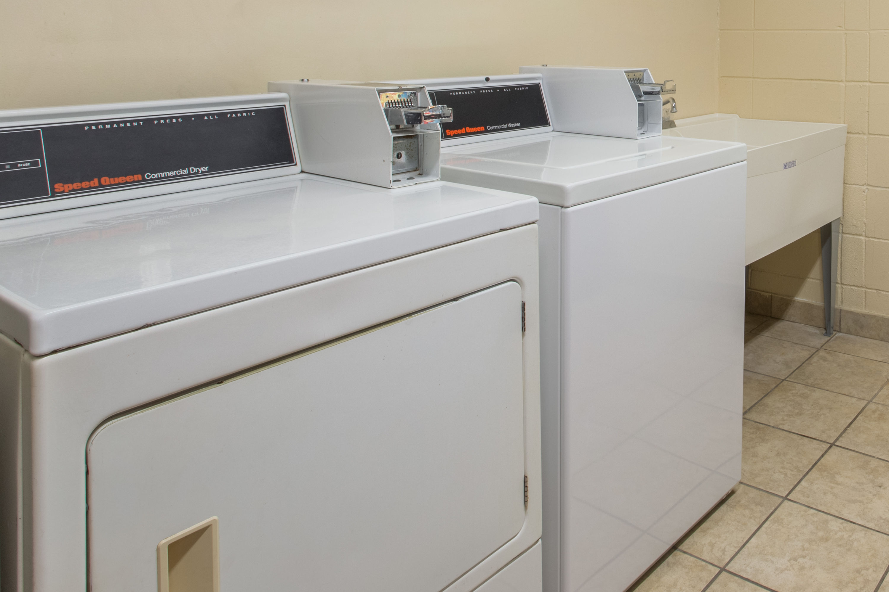 Laundry facilities at Days Inn & Suites by Wyndham Navarre - near Beaches/Hurlburt in Navarre, Florida
