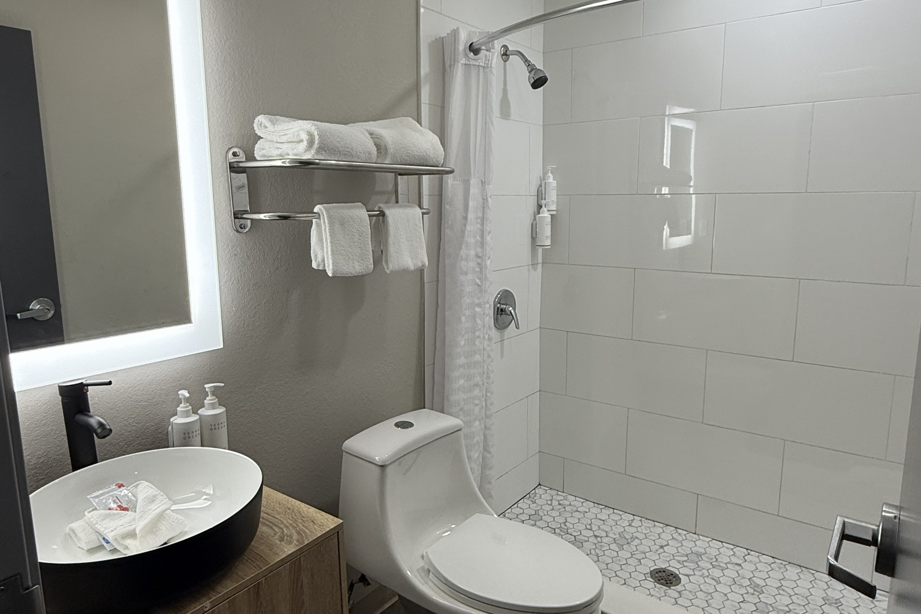 Guest room bath at the Days Inn by Wyndham Ocala North in Ocala, Florida