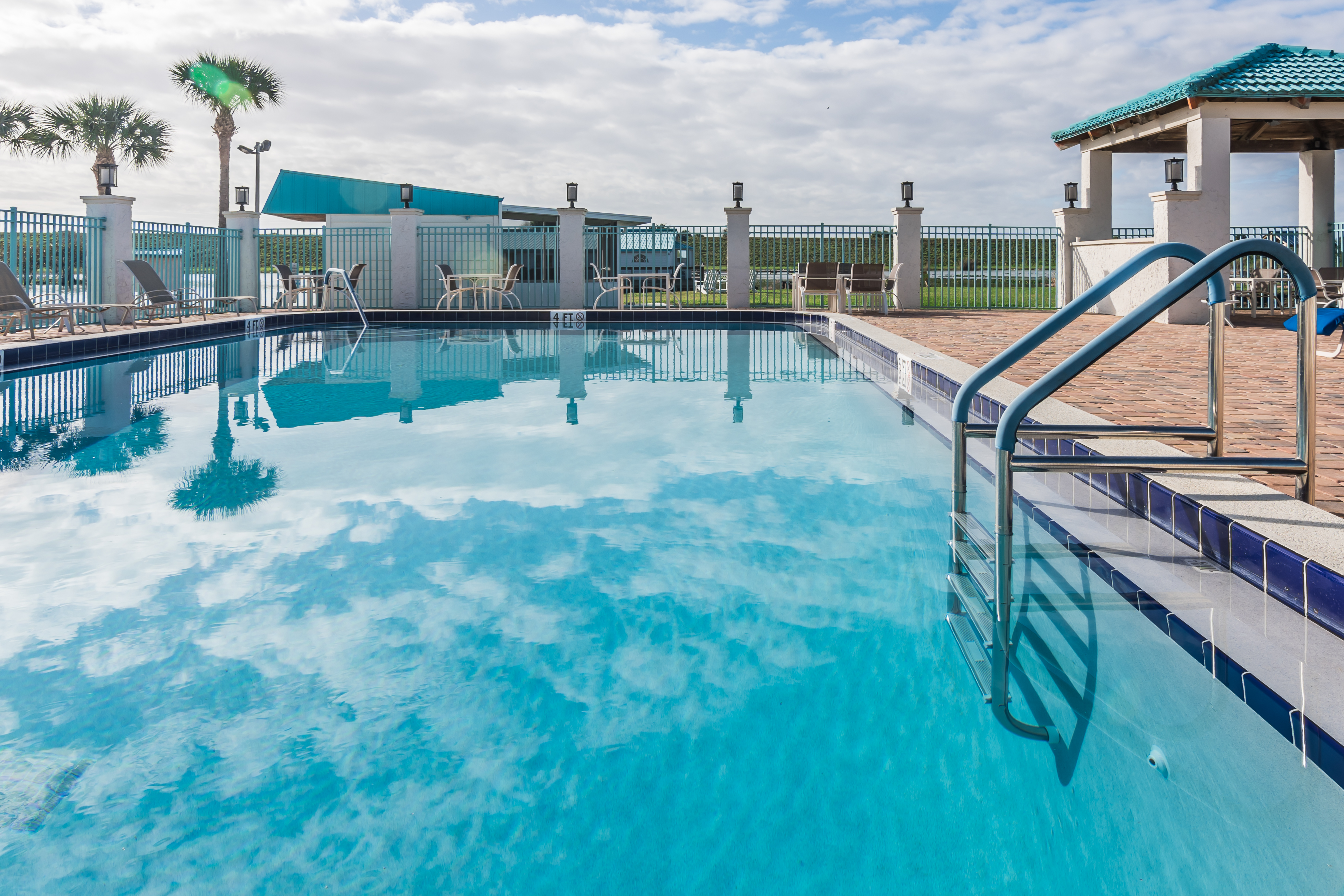 Pool at the Days Inn & Suites by Wyndham Lake Okeechobee in Okeechobee, Florida