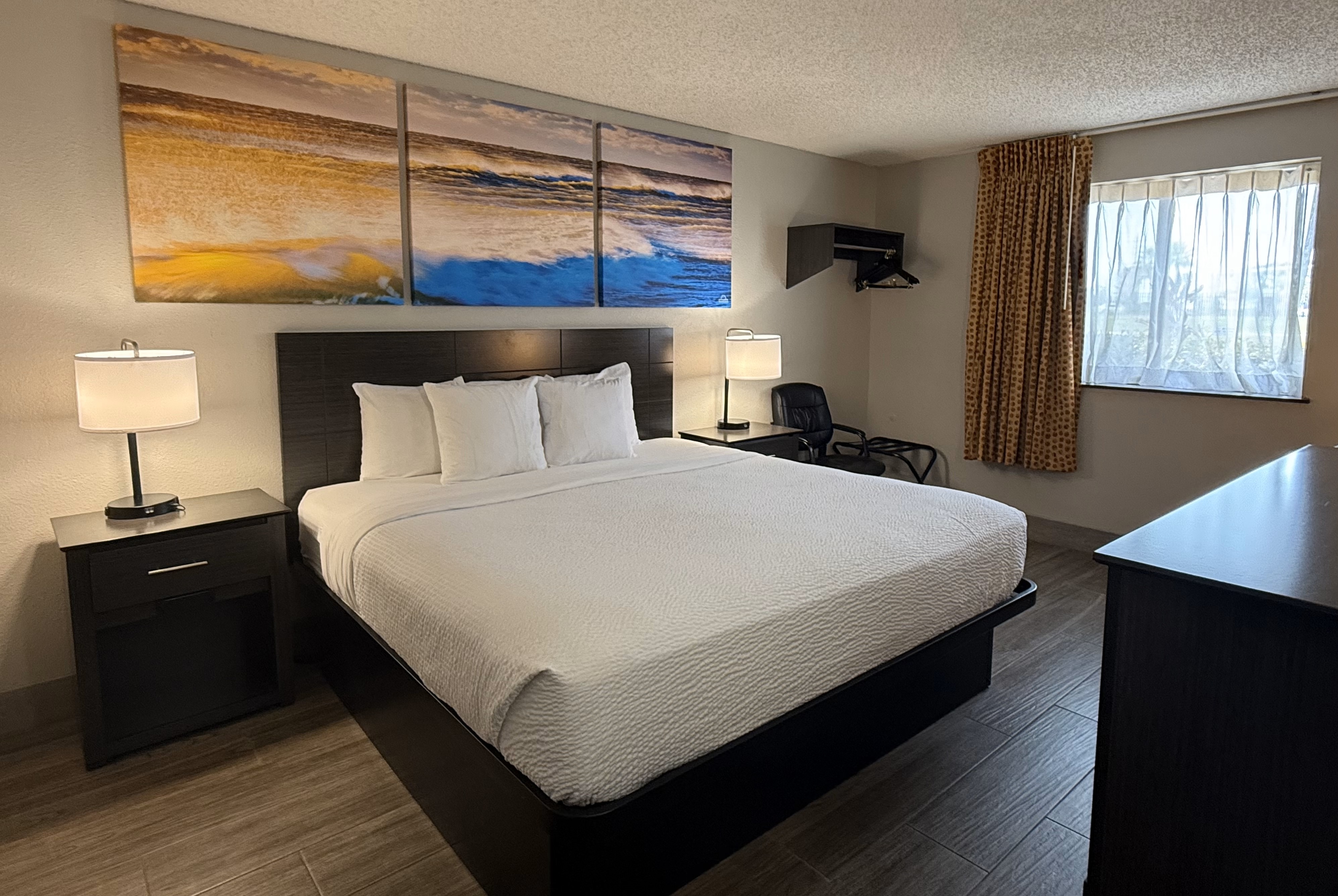 Guest room at the Days Inn by Wyndham Orange Park/Jacksonville in Orange Park, Florida