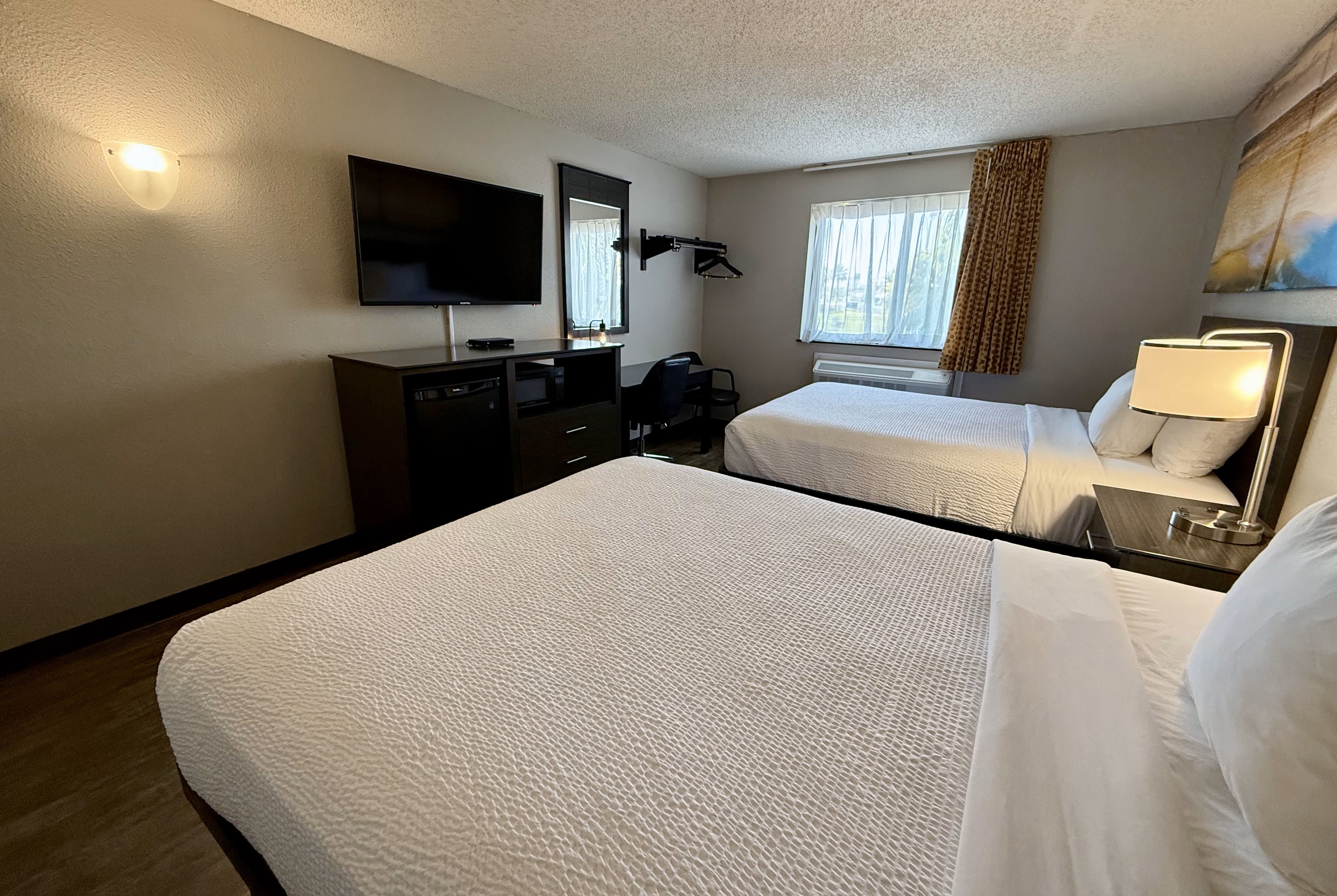 Guest room at the Days Inn by Wyndham Orange Park/Jacksonville in Orange Park, Florida