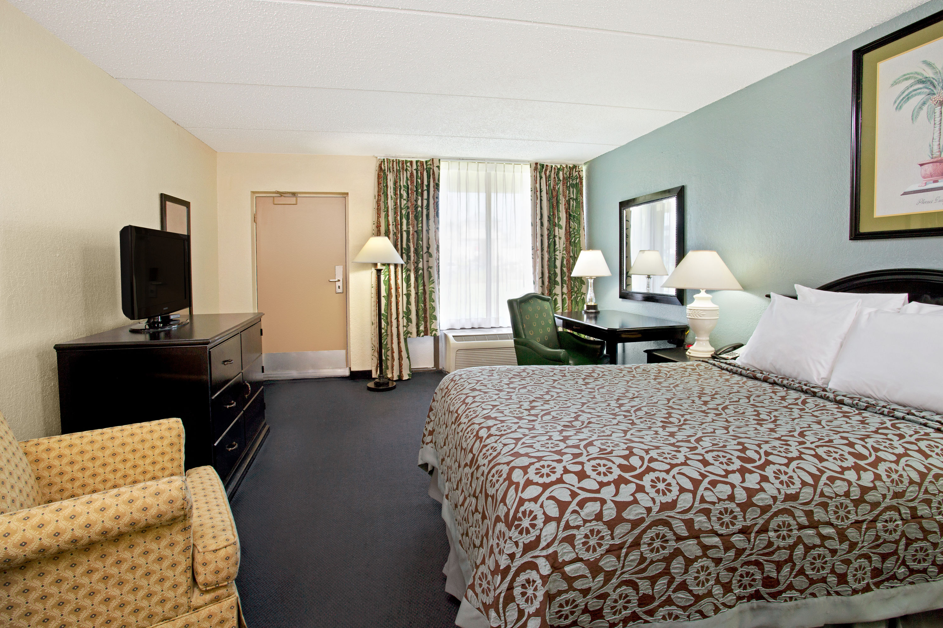 Guest room at the Days Inn by Wyndham Orlando Airport Florida Mall in Orlando, Florida