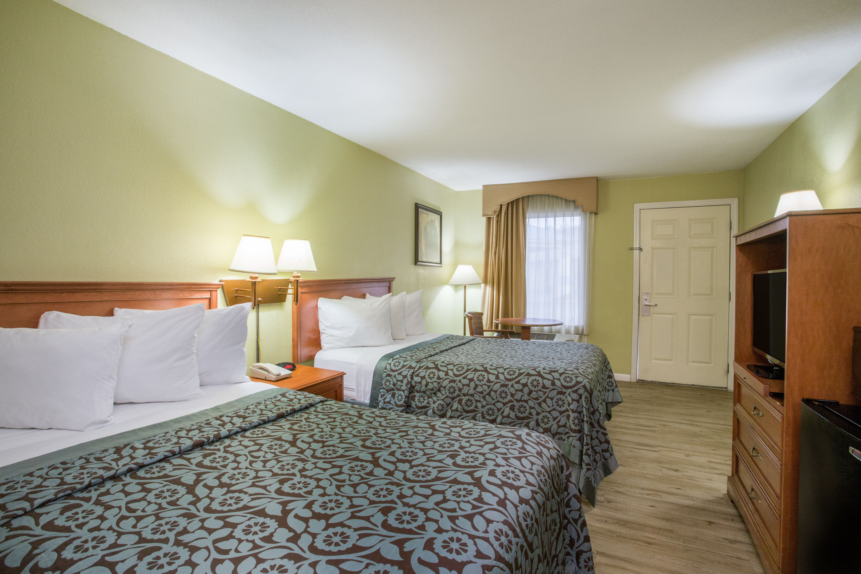 Guest room at the Days Inn by Wyndham Ormond Beach in Ormond Beach, Florida