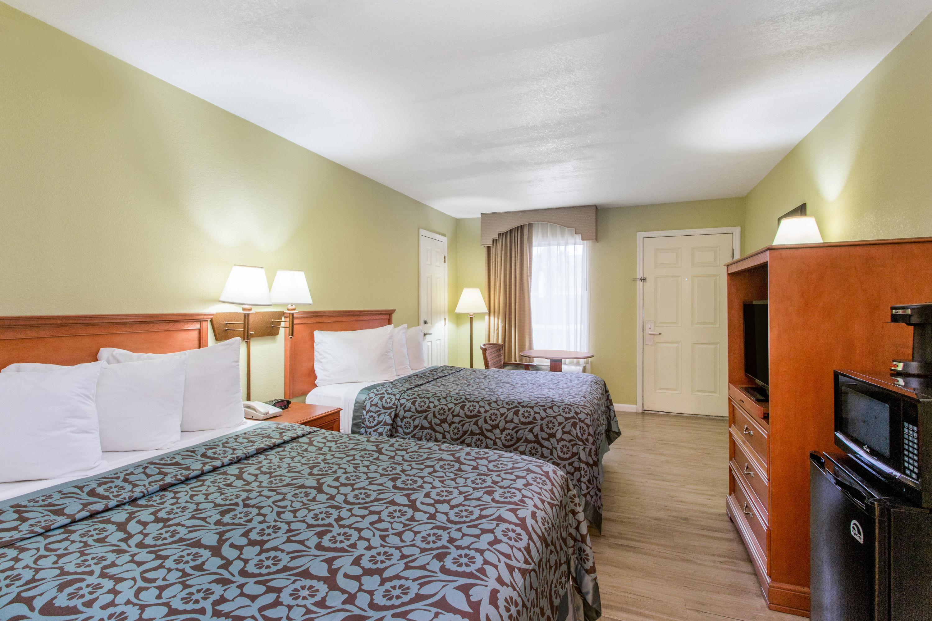 Guest room at the Days Inn by Wyndham Ormond Beach in Ormond Beach, Florida