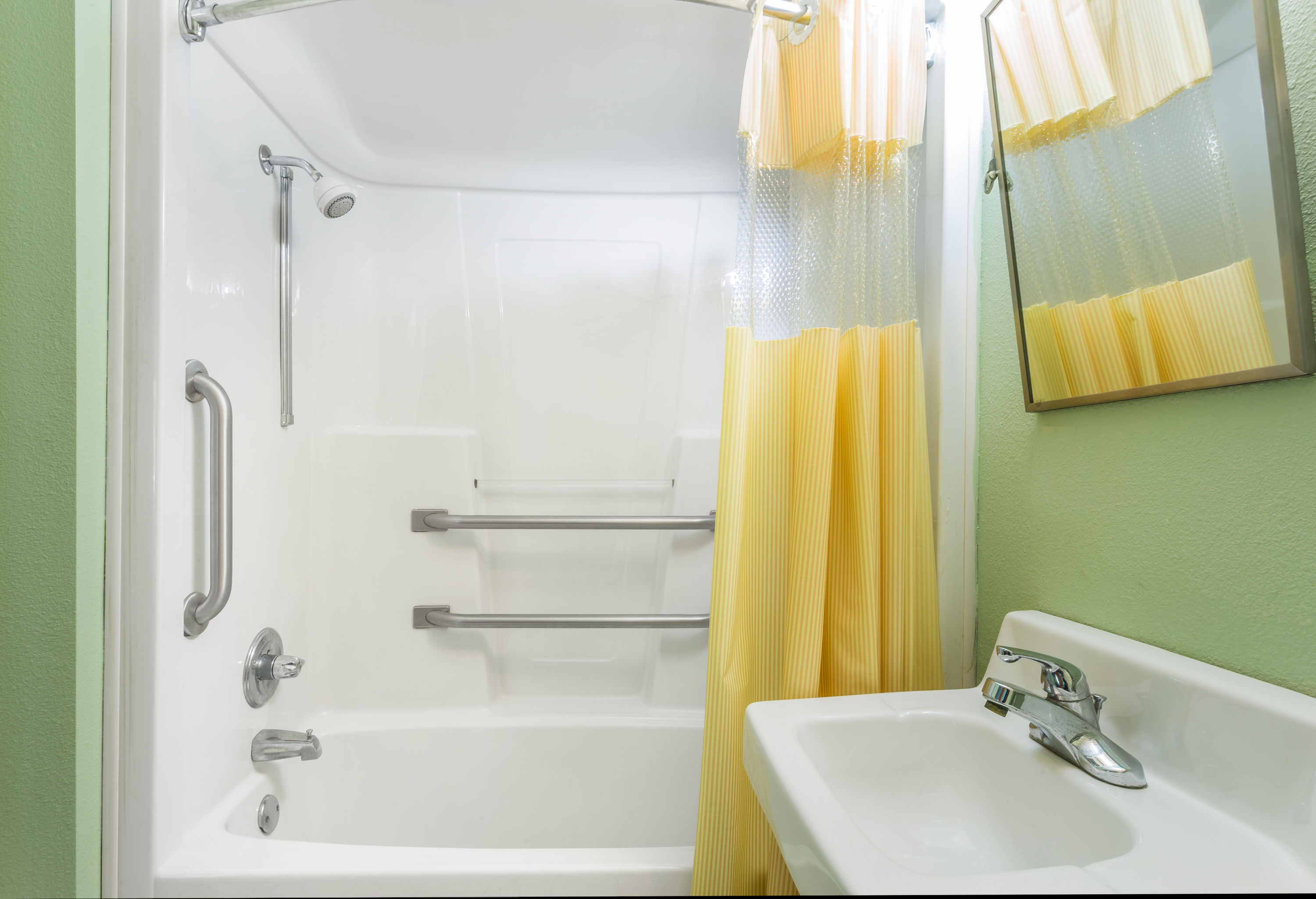 Guest room at the Days Inn by Wyndham Panama City/Callaway in Panama City, Florida