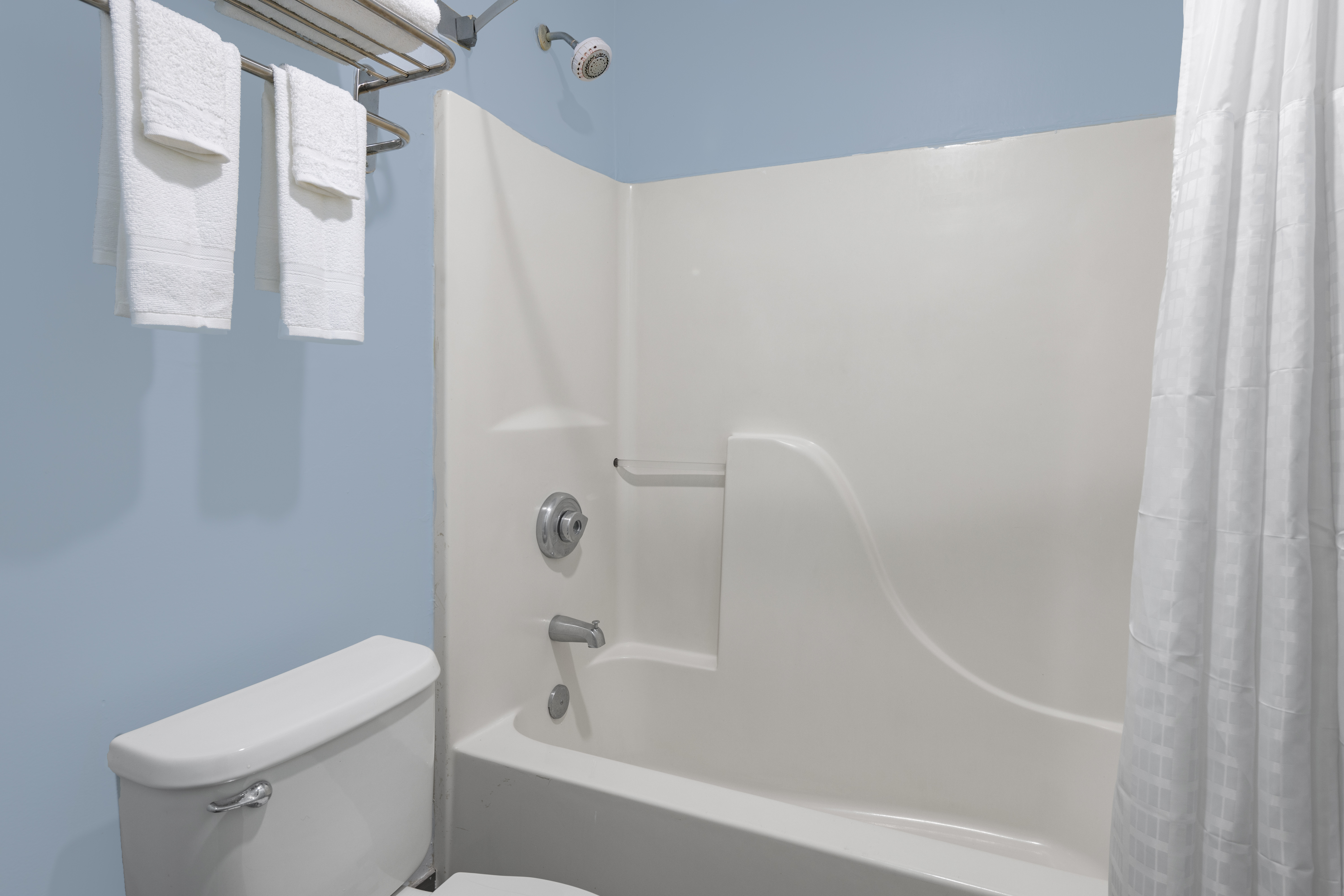 Guest room bath at the Days Inn by Wyndham Pensacola I-10 in Pensacola, Florida