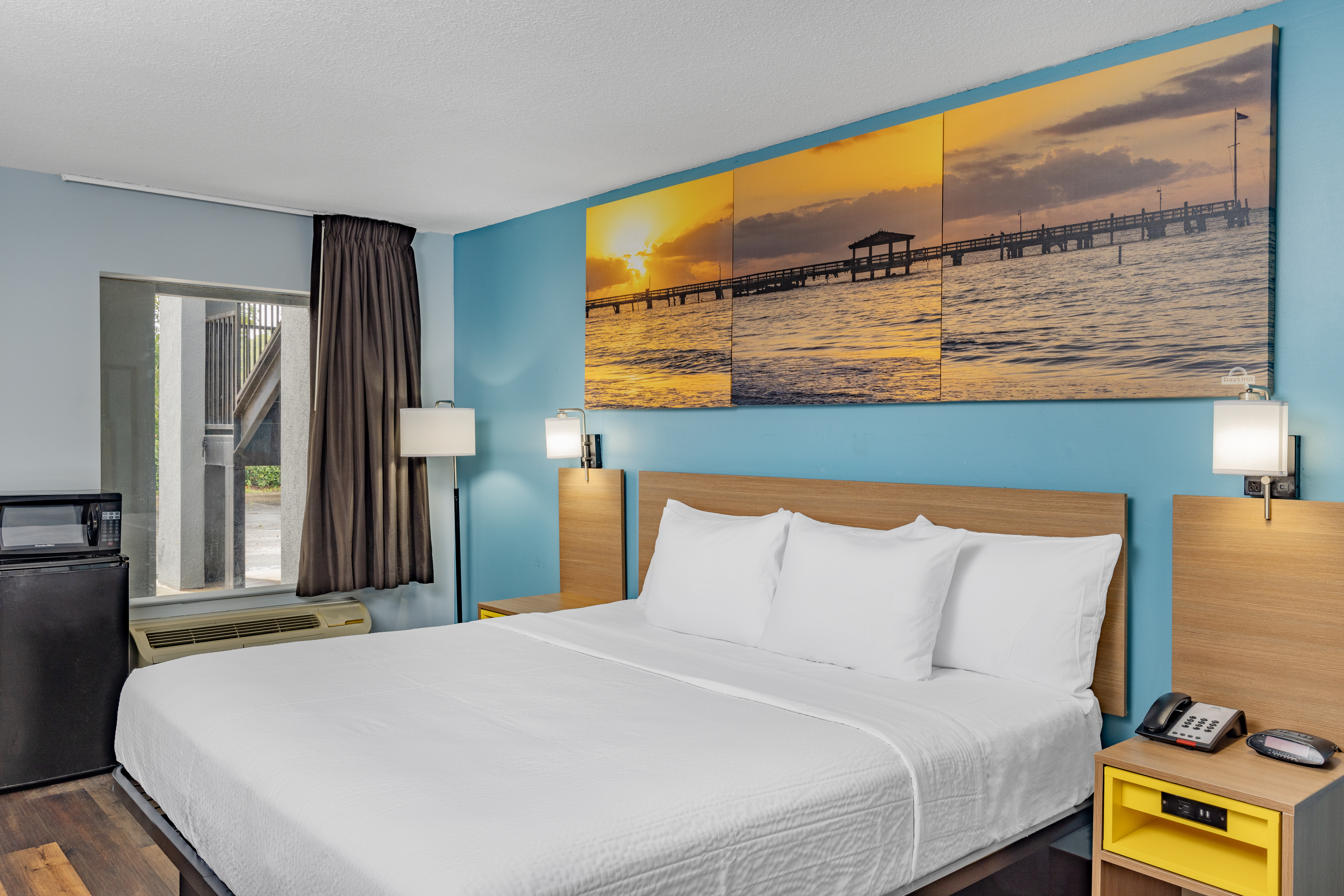 Guest room at the Days Inn by Wyndham Pensacola I-10 in Pensacola, Florida