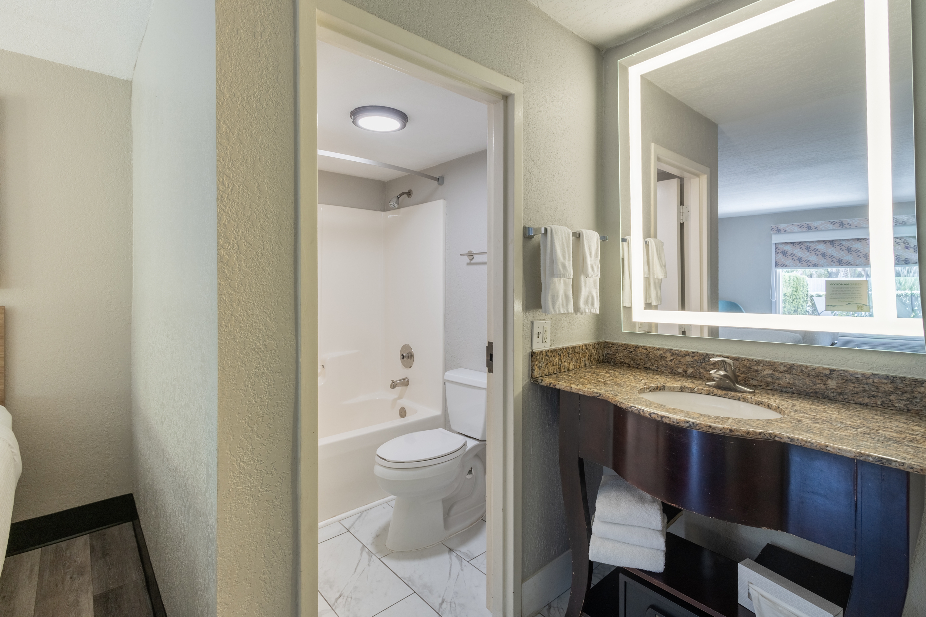 Guest room bath at the Days Inn by Wyndham Port Charlotte/Punta Gorda in Port Charlotte, Florida