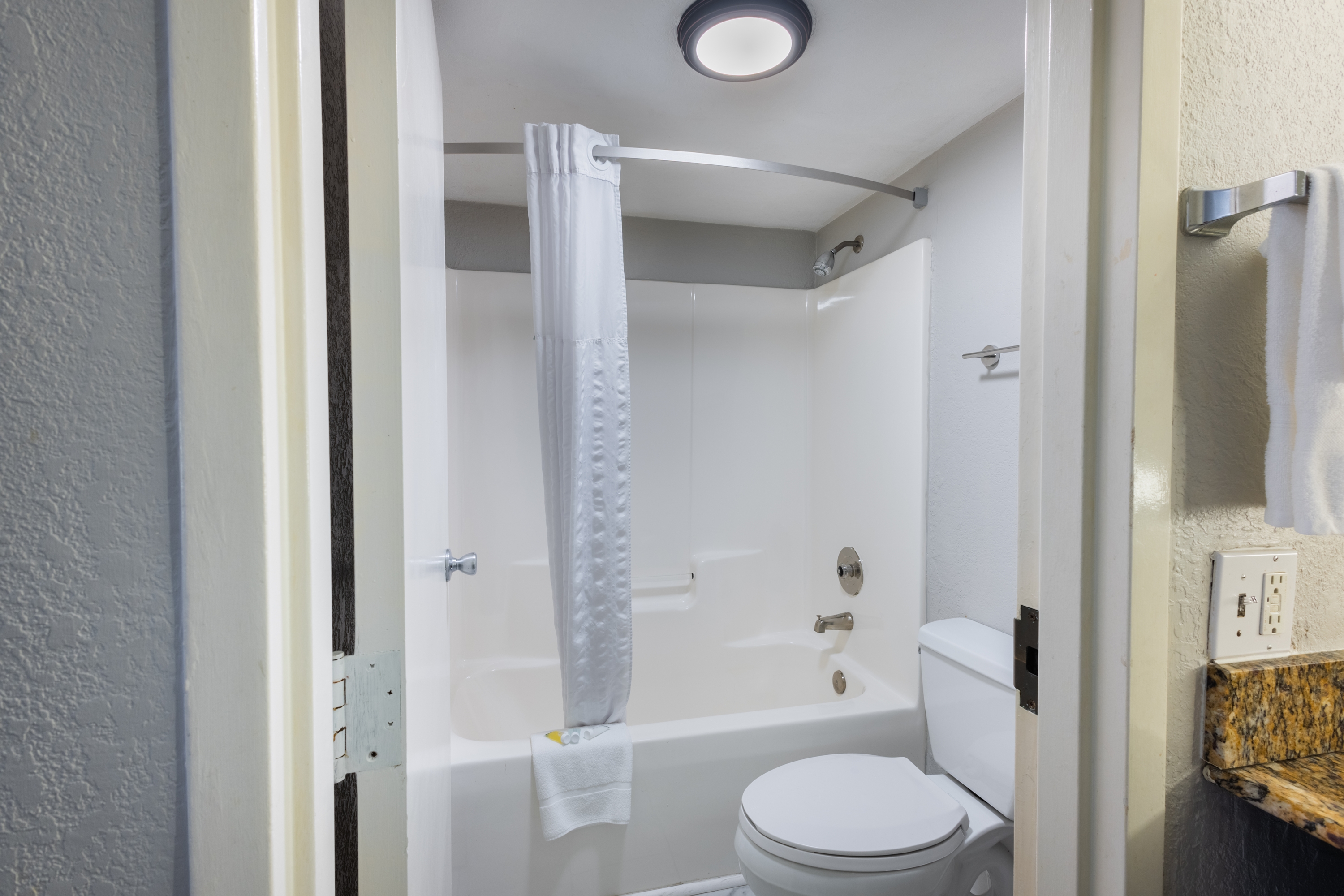 Guest room bath at the Days Inn by Wyndham Port Charlotte/Punta Gorda in Port Charlotte, Florida