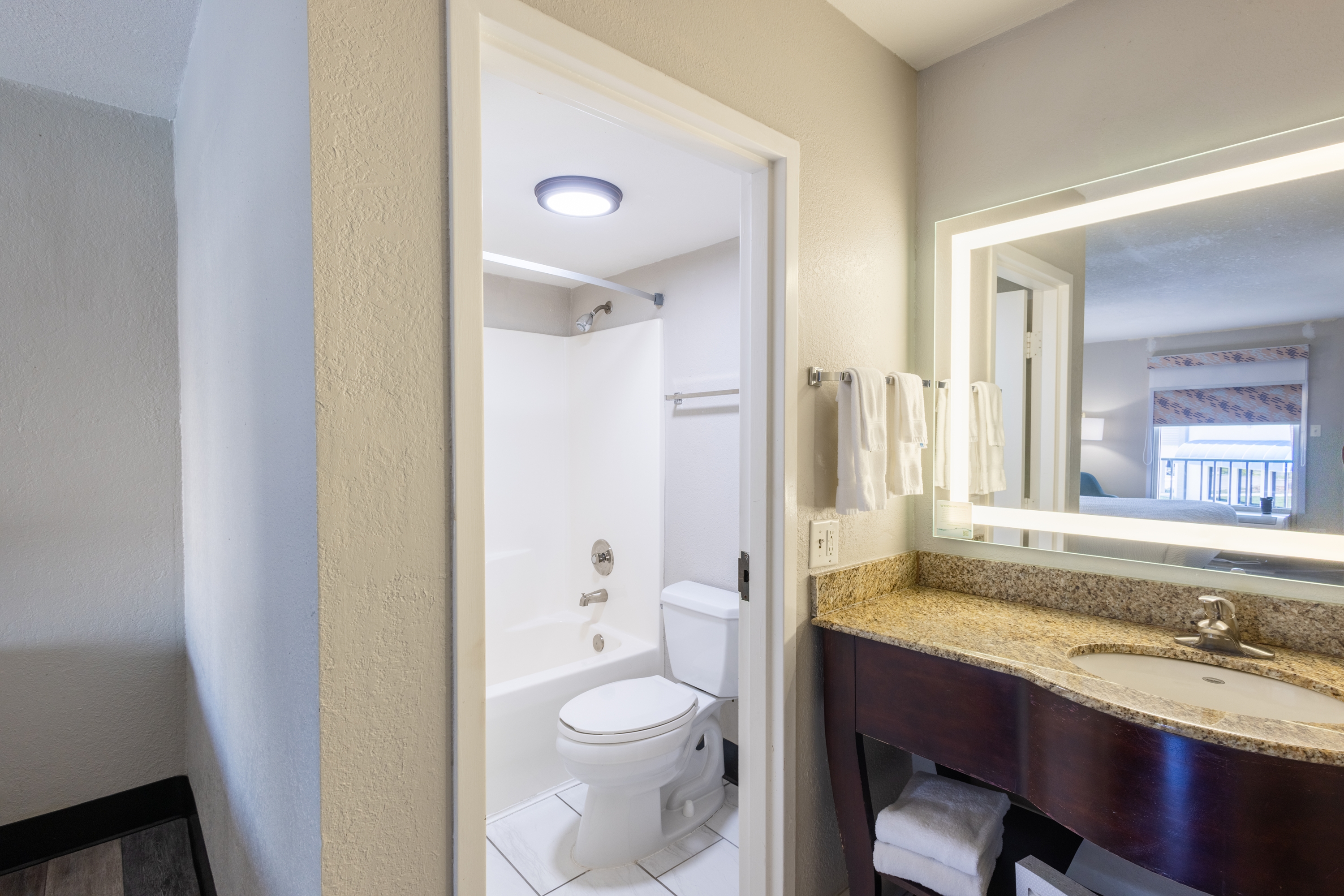 Guest room bath at the Days Inn by Wyndham Port Charlotte/Punta Gorda in Port Charlotte, Florida