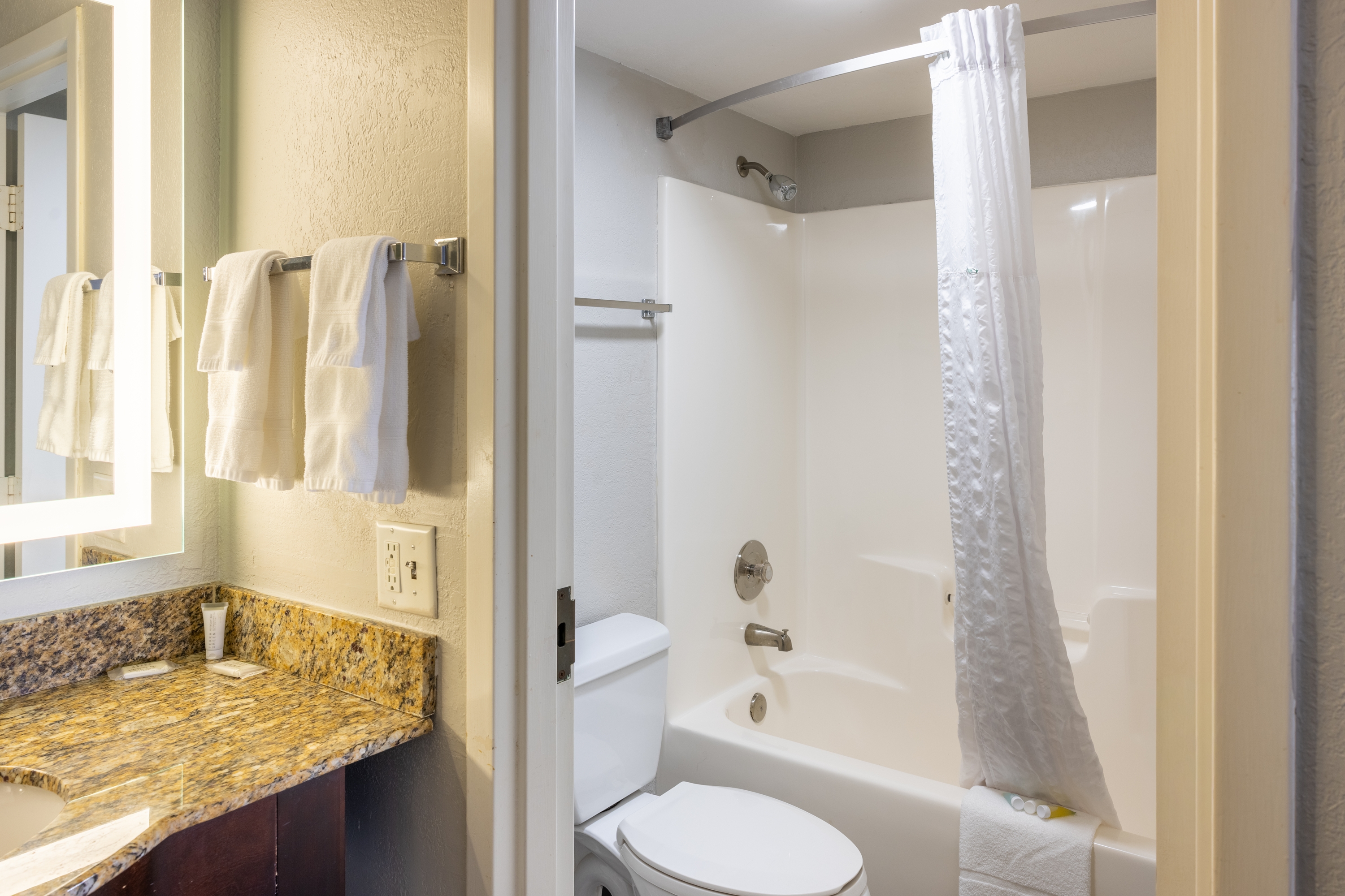 Guest room bath at the Days Inn by Wyndham Port Charlotte/Punta Gorda in Port Charlotte, Florida