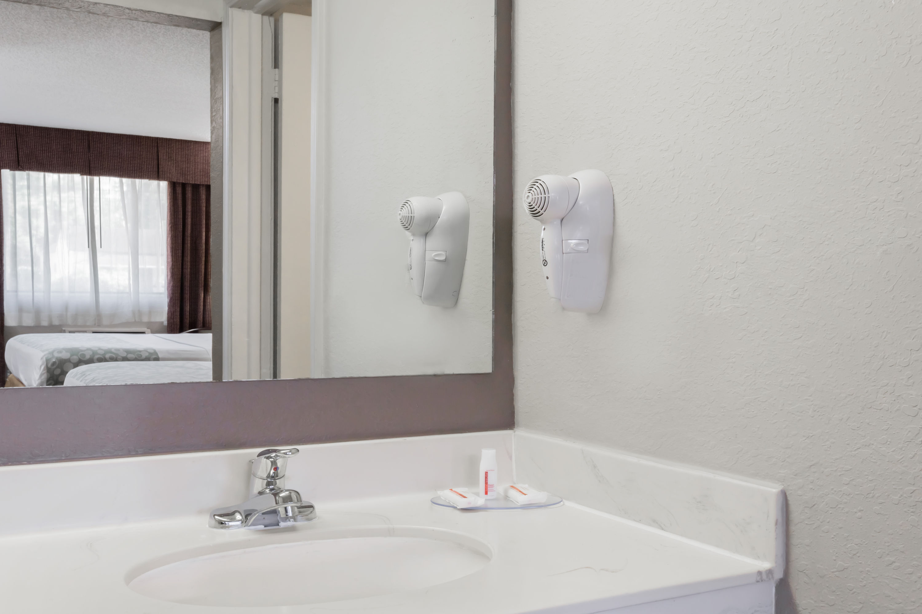 Guest room bath at the Days Inn by Wyndham St Augustine/Historic Downtown in Saint Augustine, Florida