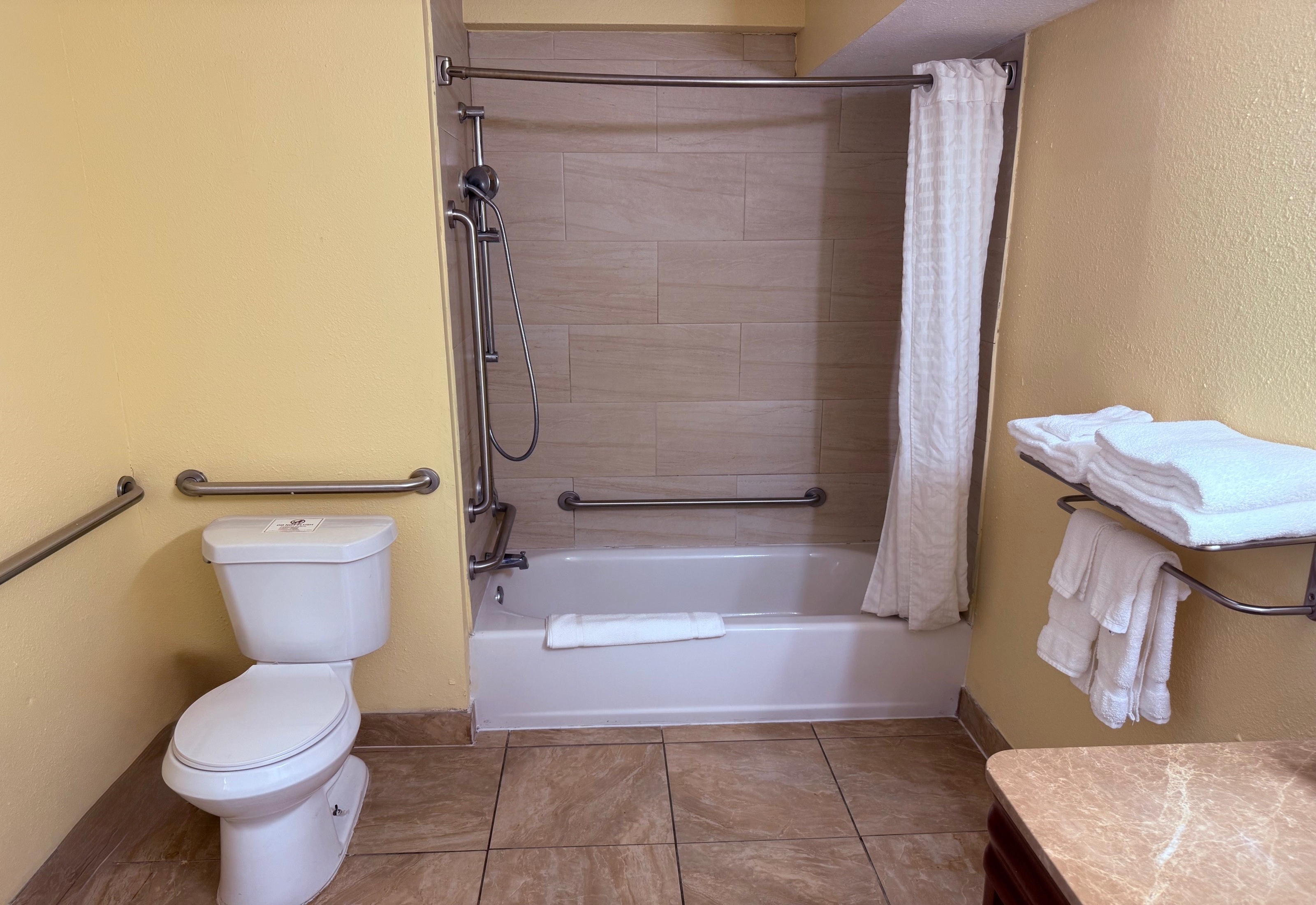 Guest room bath at the Days Inn by Wyndham St. Petersburg / Tampa Bay Area in Saint Petersburg, Florida