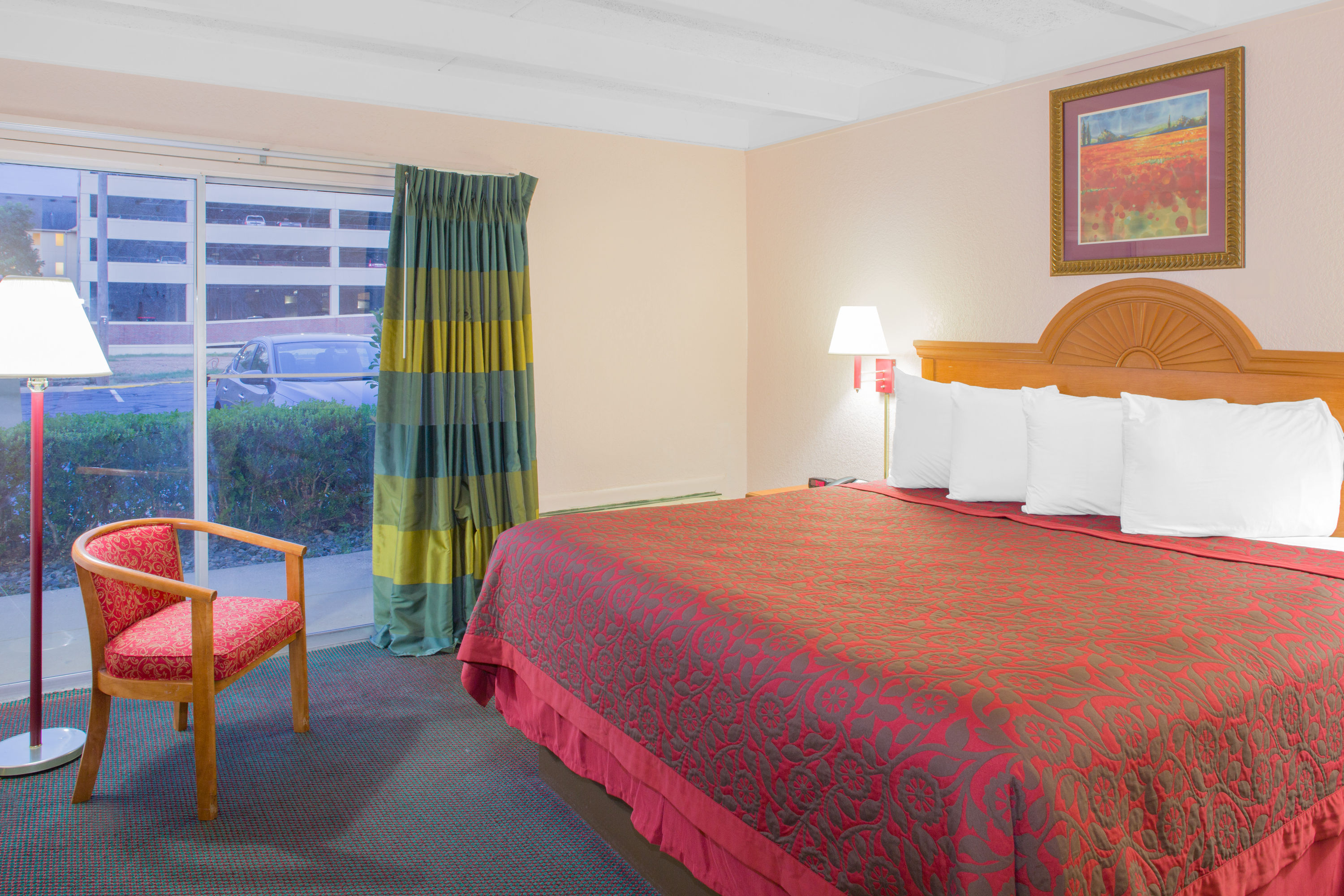 Guest room at the Days Inn by Wyndham Tallahassee University Center in Tallahassee, Florida