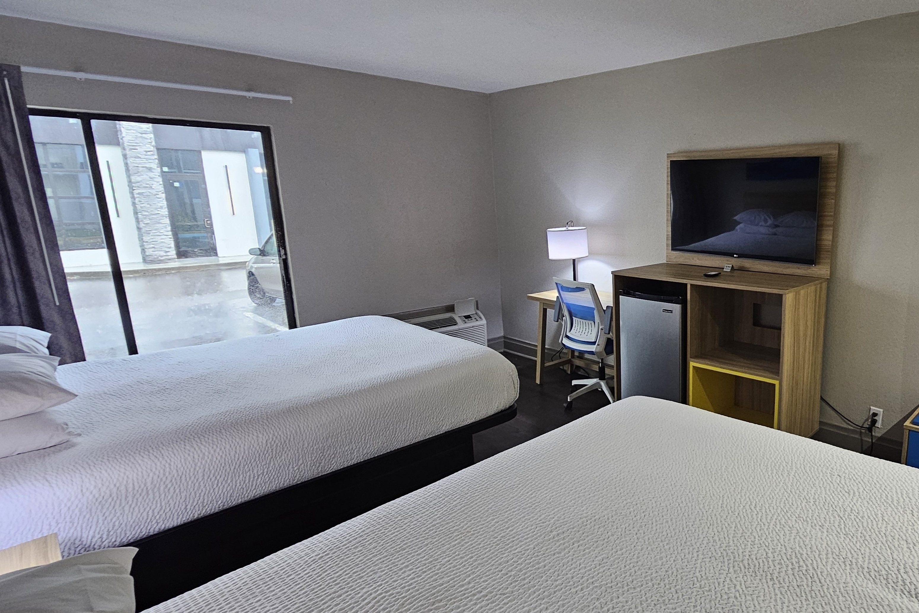Guest room at the Days Inn & Suites by Wyndham Tampa/Fairground/Casino Area in Tampa, Florida