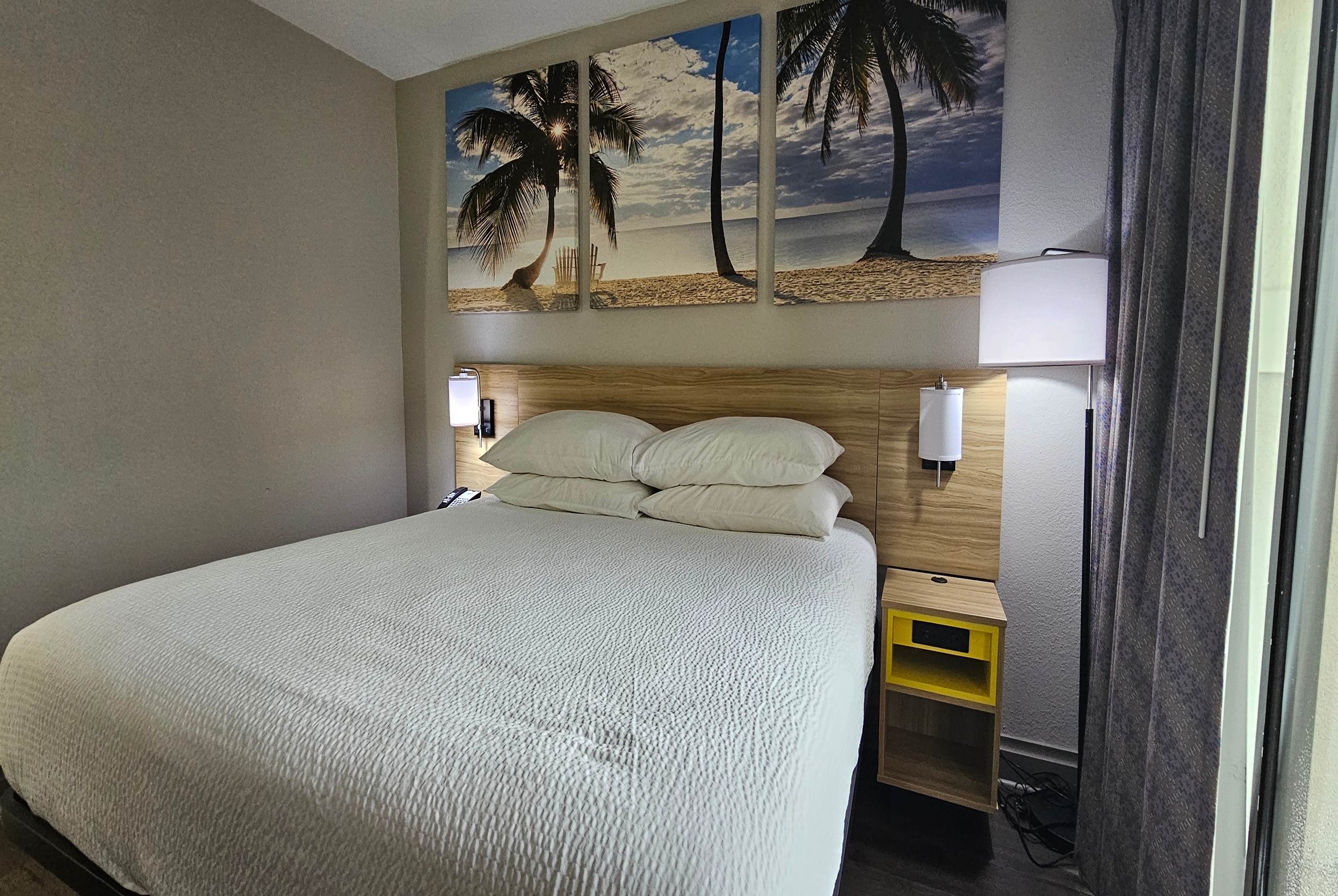 Guest room at the Days Inn & Suites by Wyndham Tampa/Fairground/Casino Area in Tampa, Florida