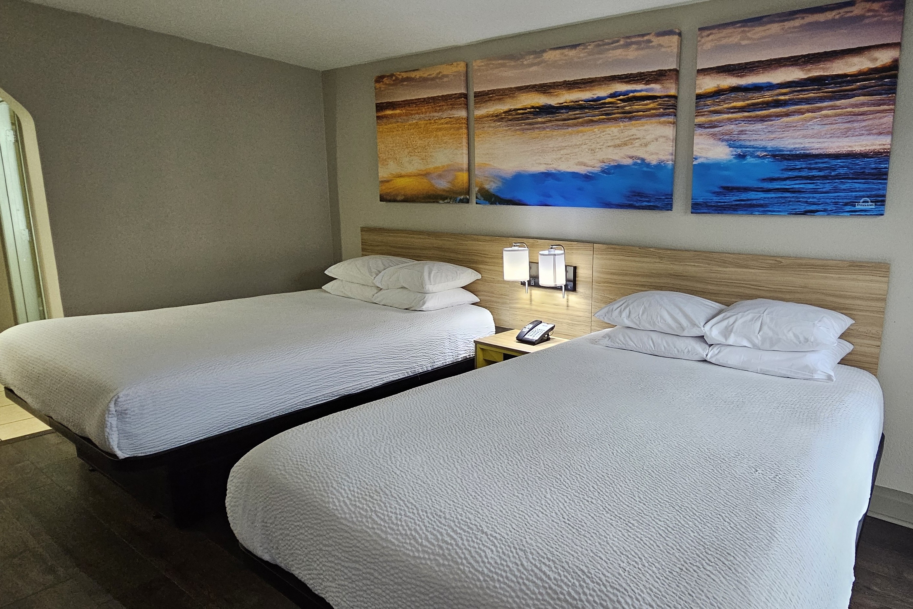Guest room at the Days Inn & Suites by Wyndham Tampa/Fairground/Casino Area in Tampa, Florida