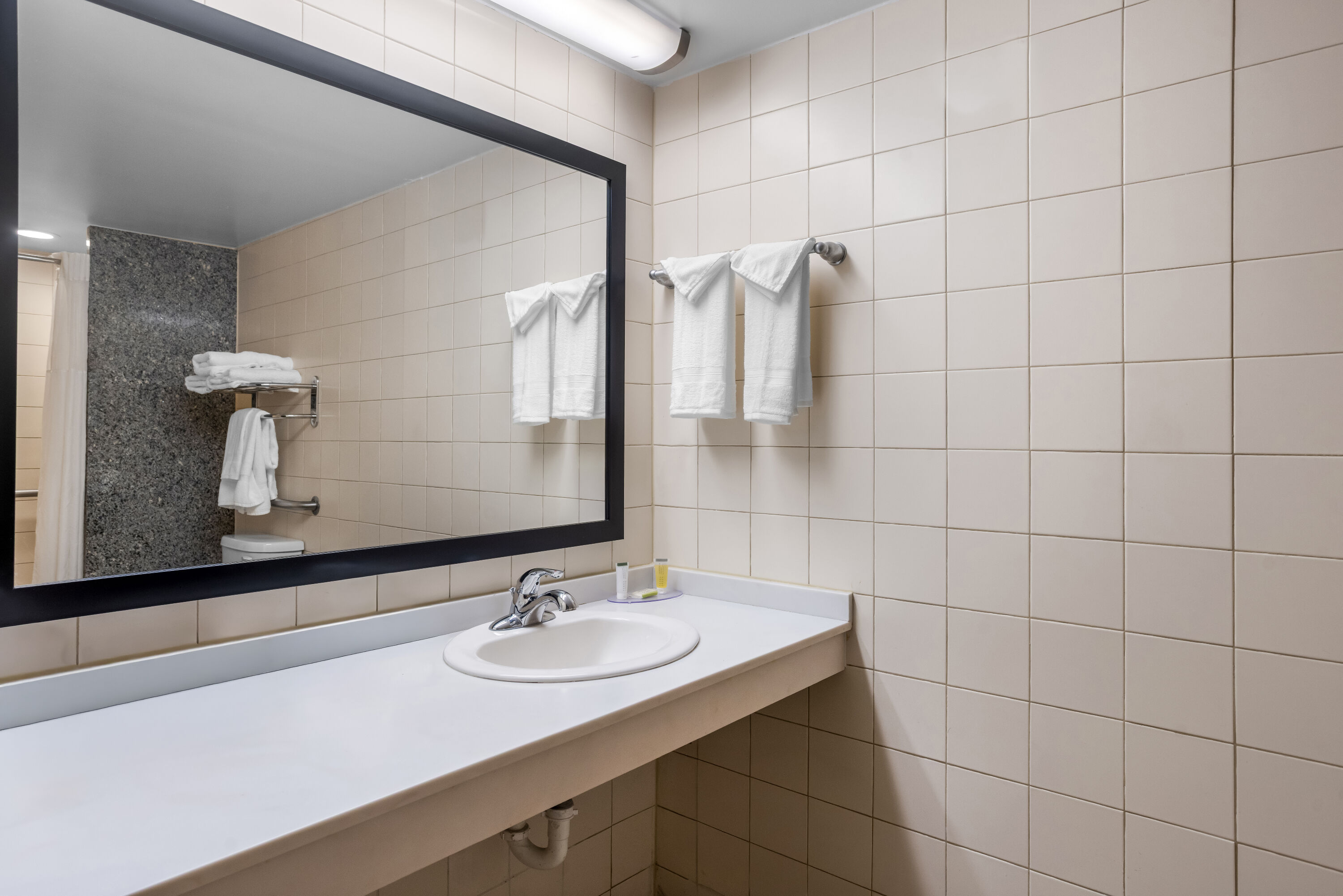 Guest room bath at the Days Inn by Wyndham Adel I-75 in Adel, Georgia