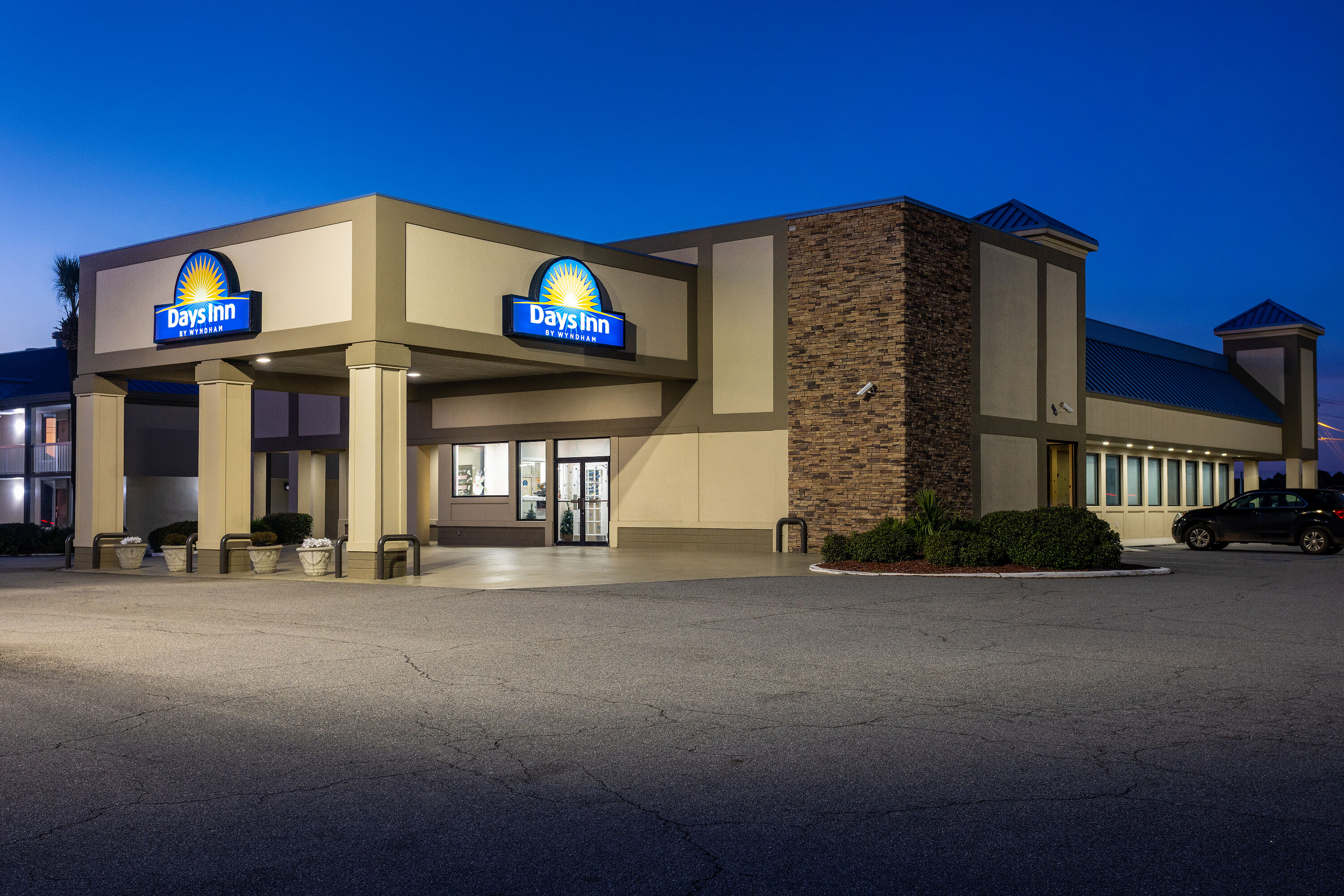 Exterior Night Image of Days Inn by Wyndham Adel I-75 hotel in Adel, Georgia