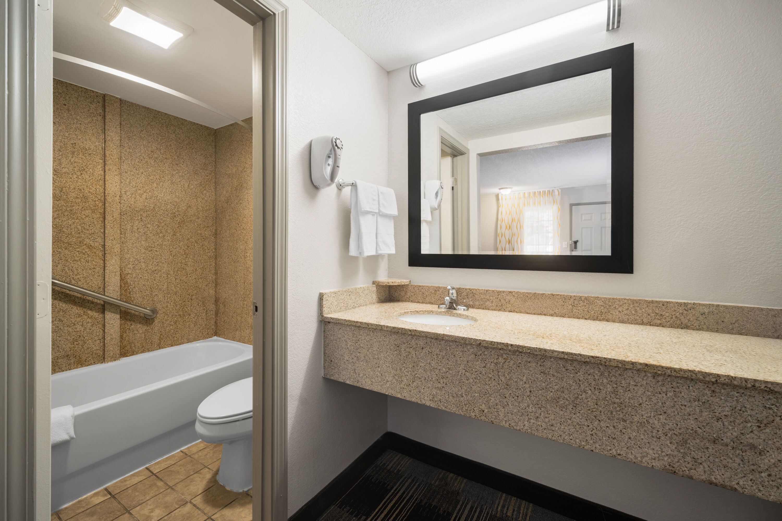 Guest room bath at the Days Inn by Wyndham Canton in Canton, Georgia