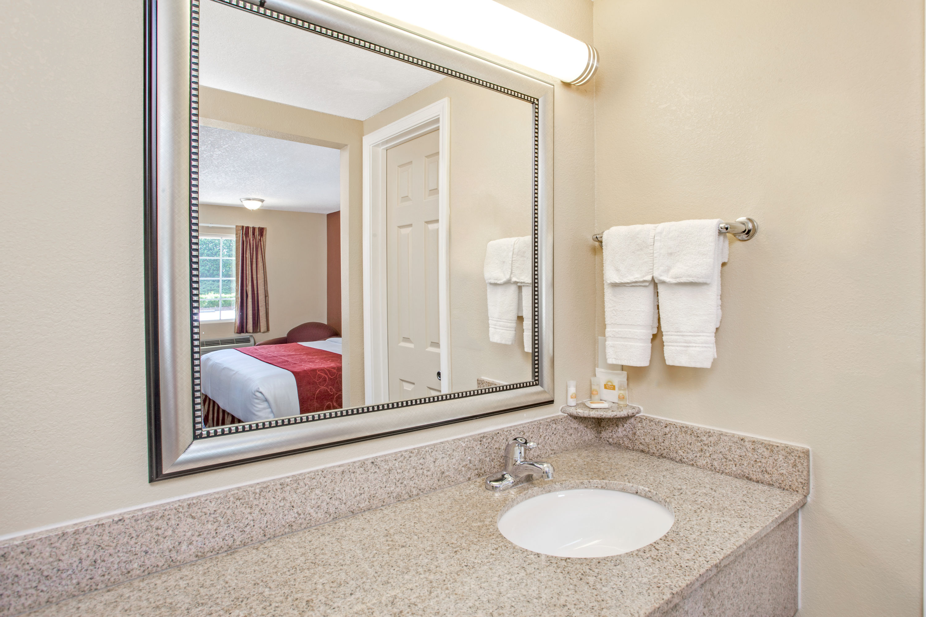 Guest room bath at the Days Inn by Wyndham Canton in Canton, Georgia