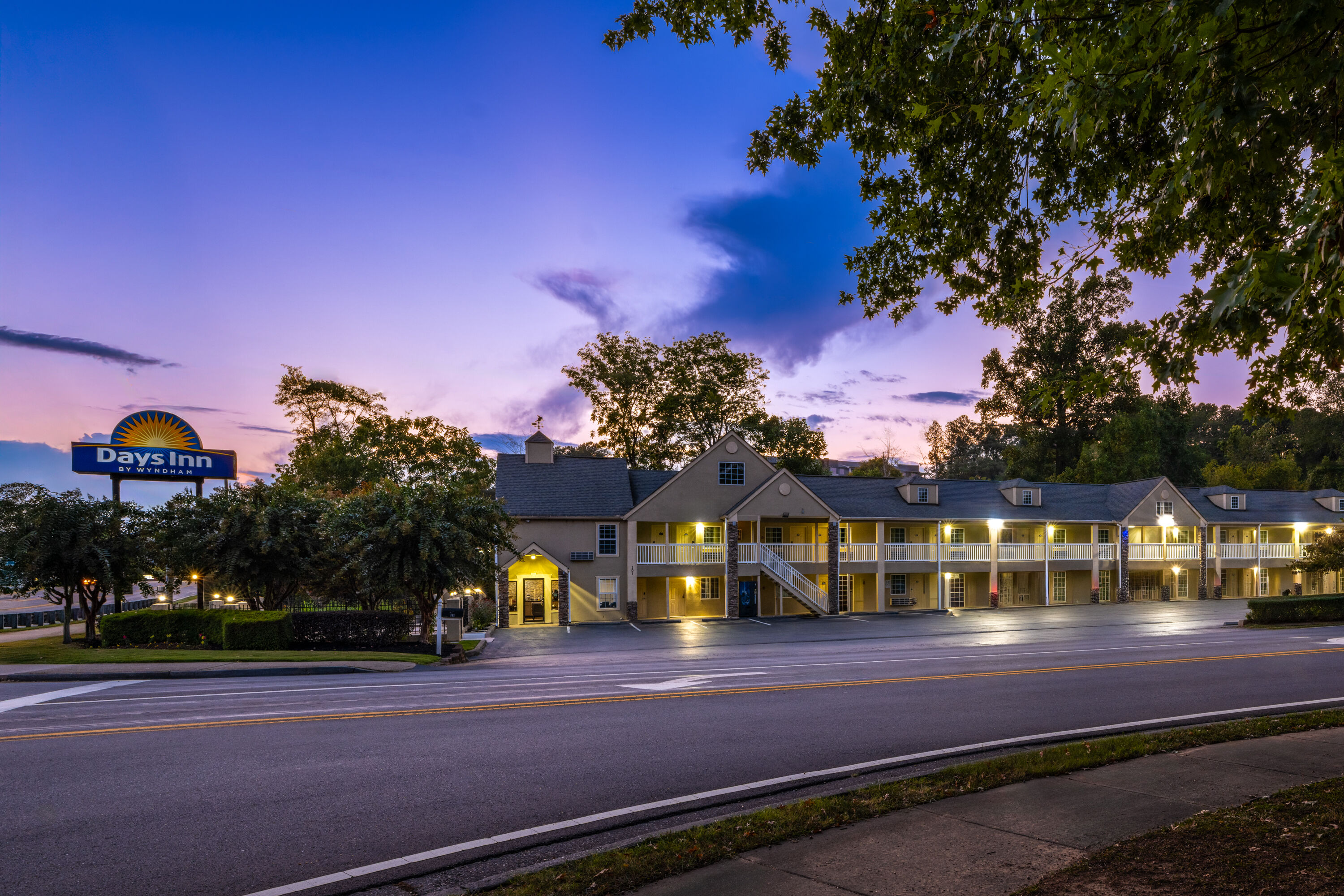 Exterior Dusk Image of Days Inn by Wyndham Canton hotel in Canton, Georgia