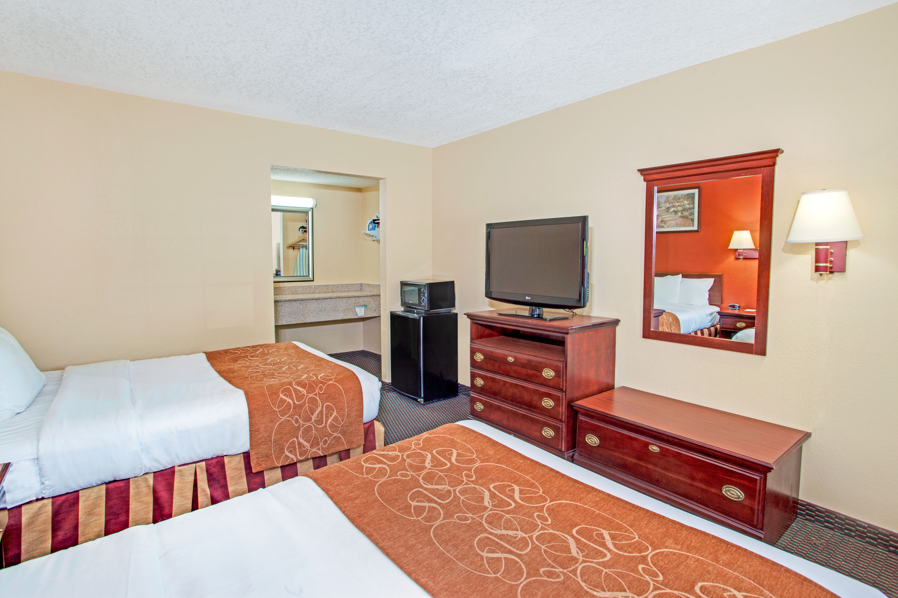 Guest room at the Days Inn by Wyndham Canton in Canton, Georgia