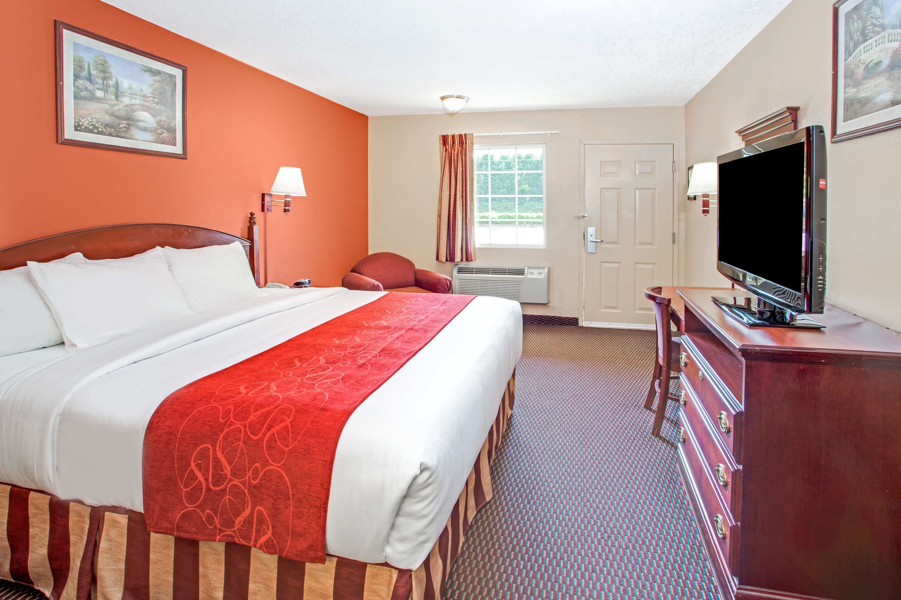 Guest room at the Days Inn by Wyndham Canton in Canton, Georgia