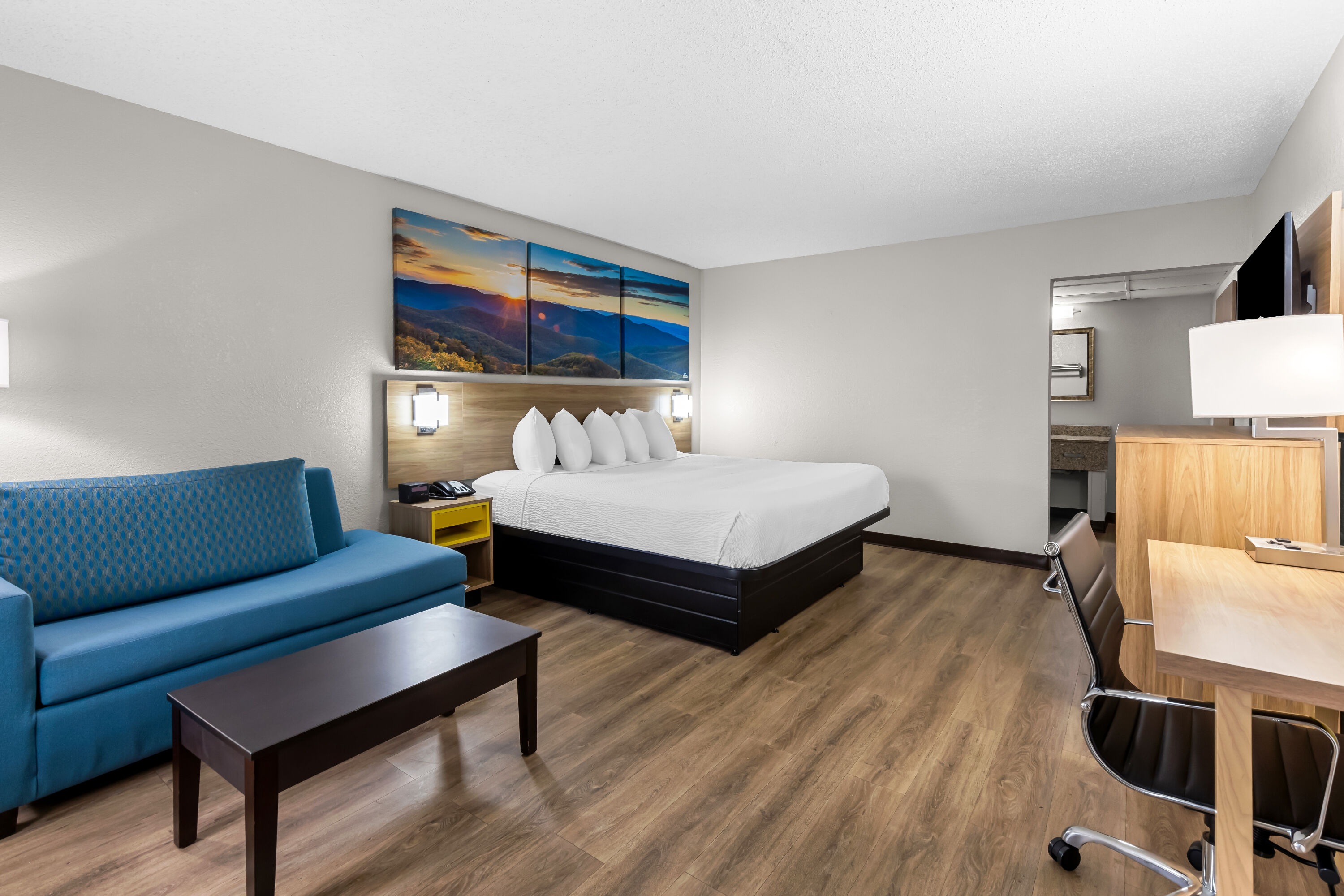 King bed guest room at the Days Inn by Wyndham Clayton in Clayton, Georgia