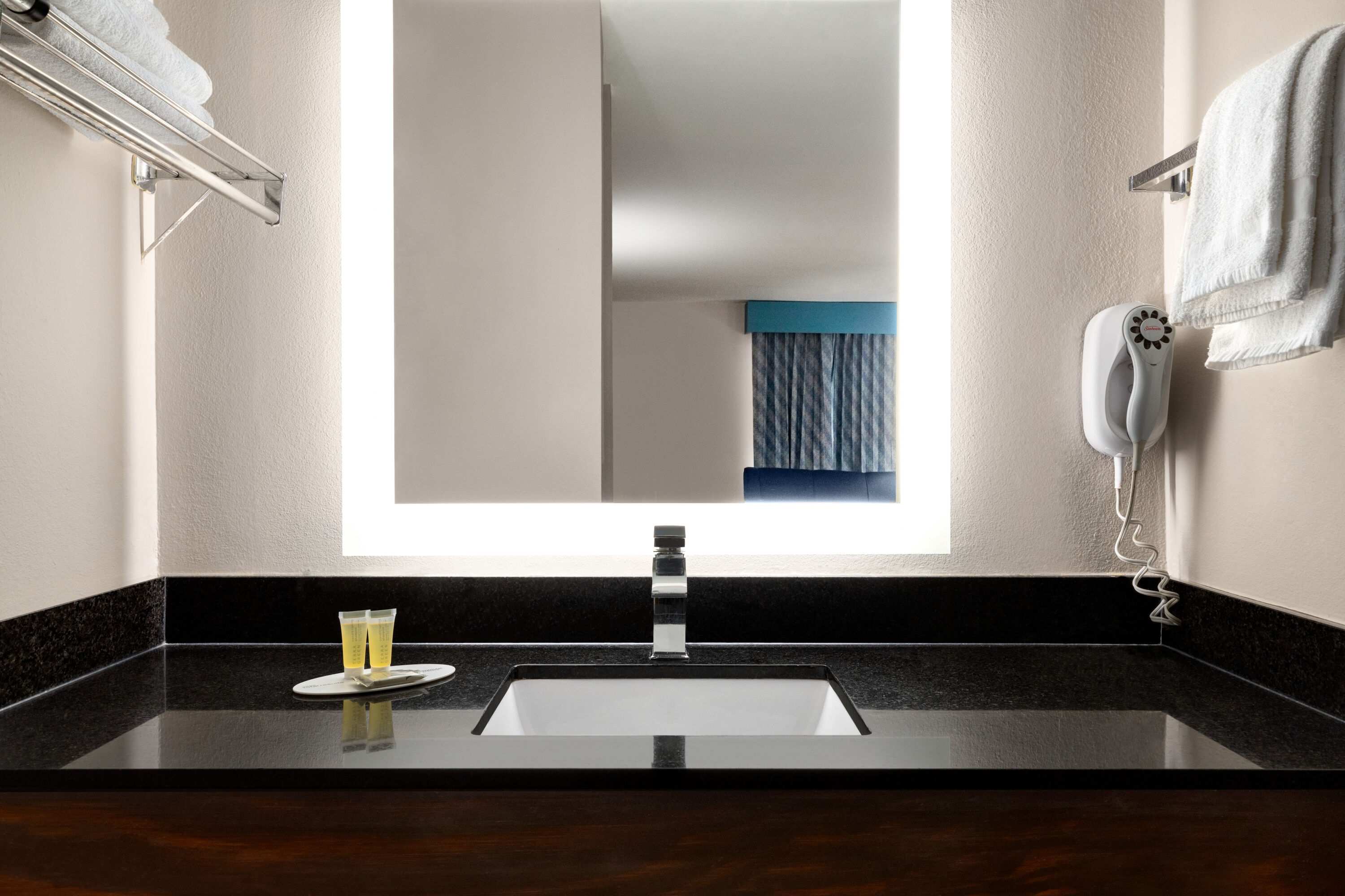 Guest room bath at the Days Inn by Wyndham Covington in Covington, Georgia