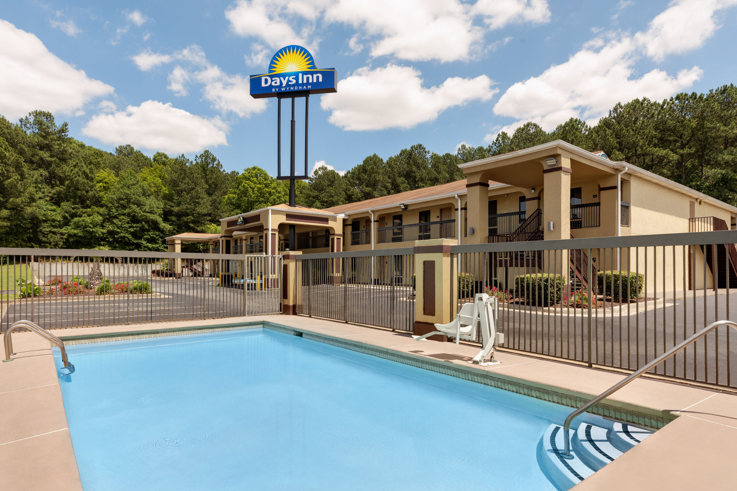 Family pool at the Days Inn by Wyndham Covington in Covington, Georgia