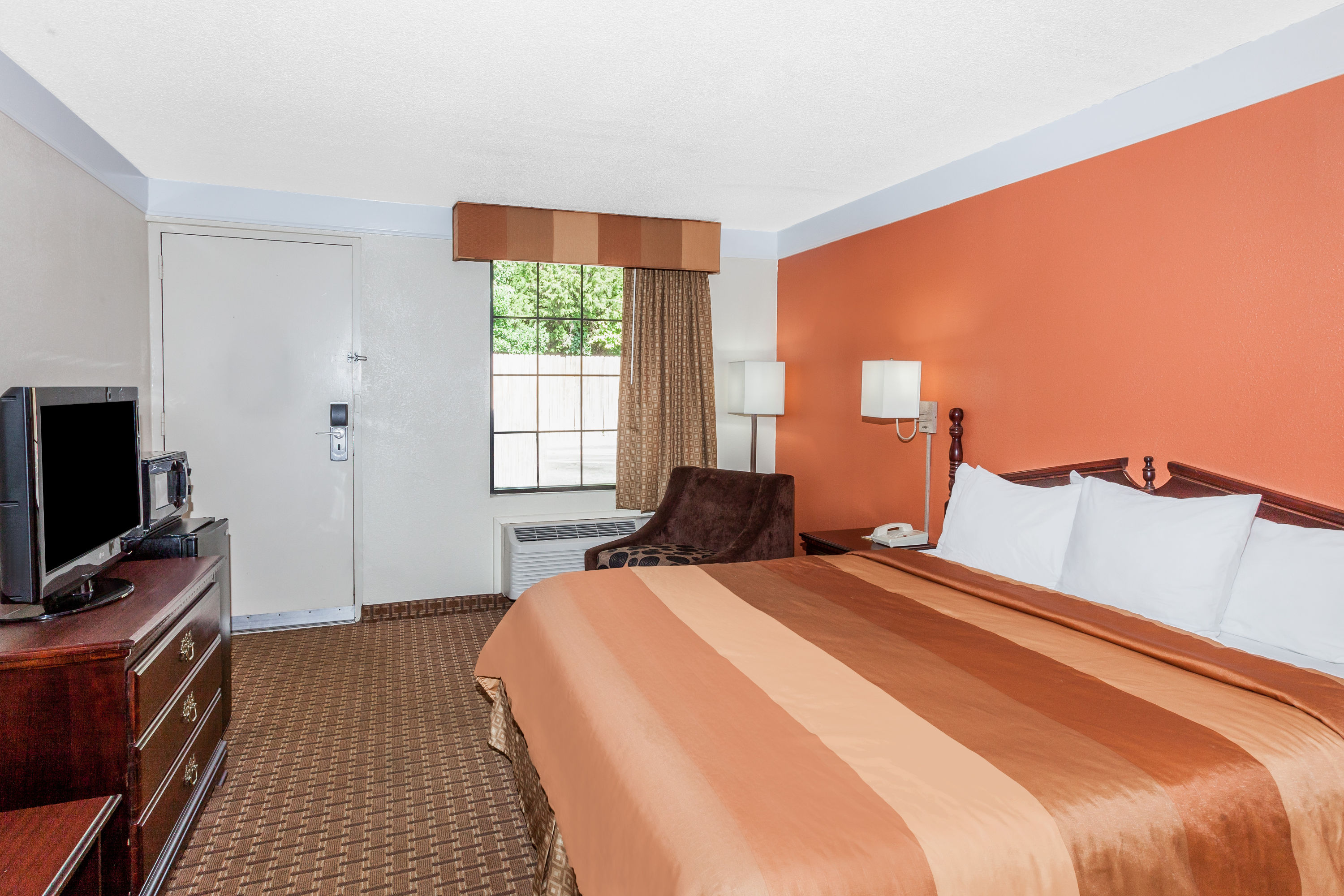 Guest room at the Days Inn by Wyndham Dalton in Dalton, Georgia
