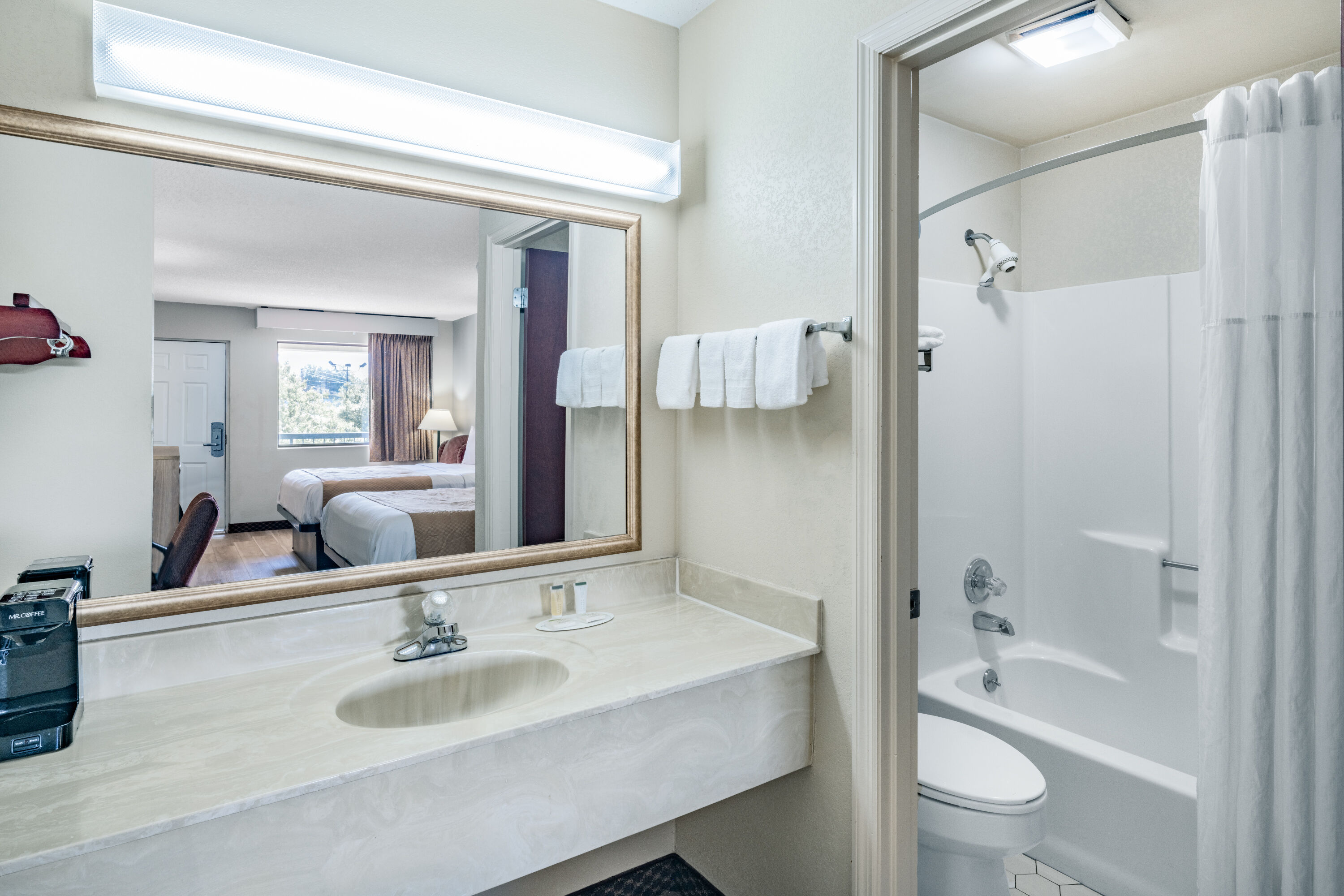 Guest room bath at the Days Inn by Wyndham Macon I-475 in Macon, Georgia