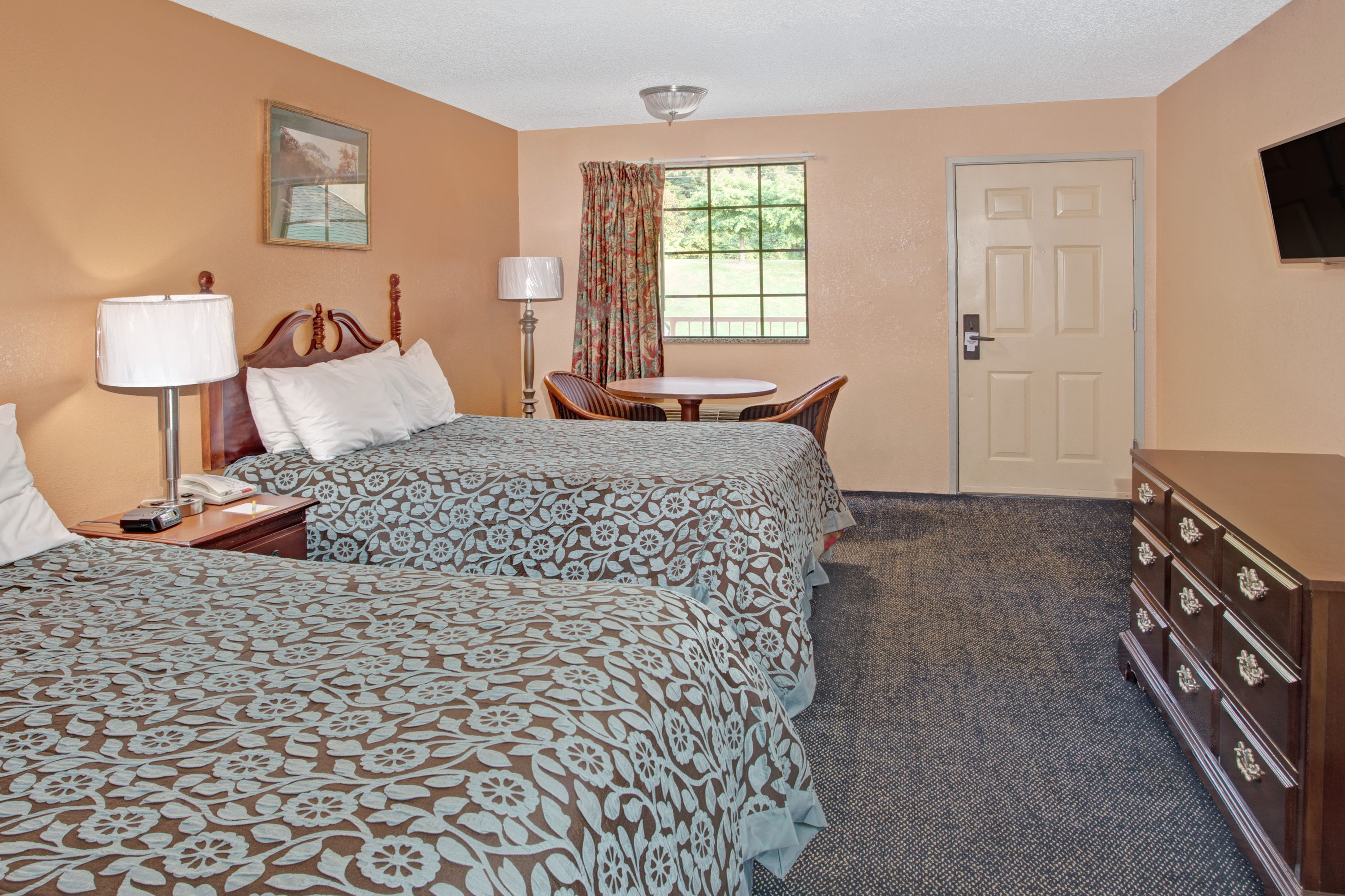 Guest room at the Days Inn by Wyndham Marietta White Water in Marietta, Georgia