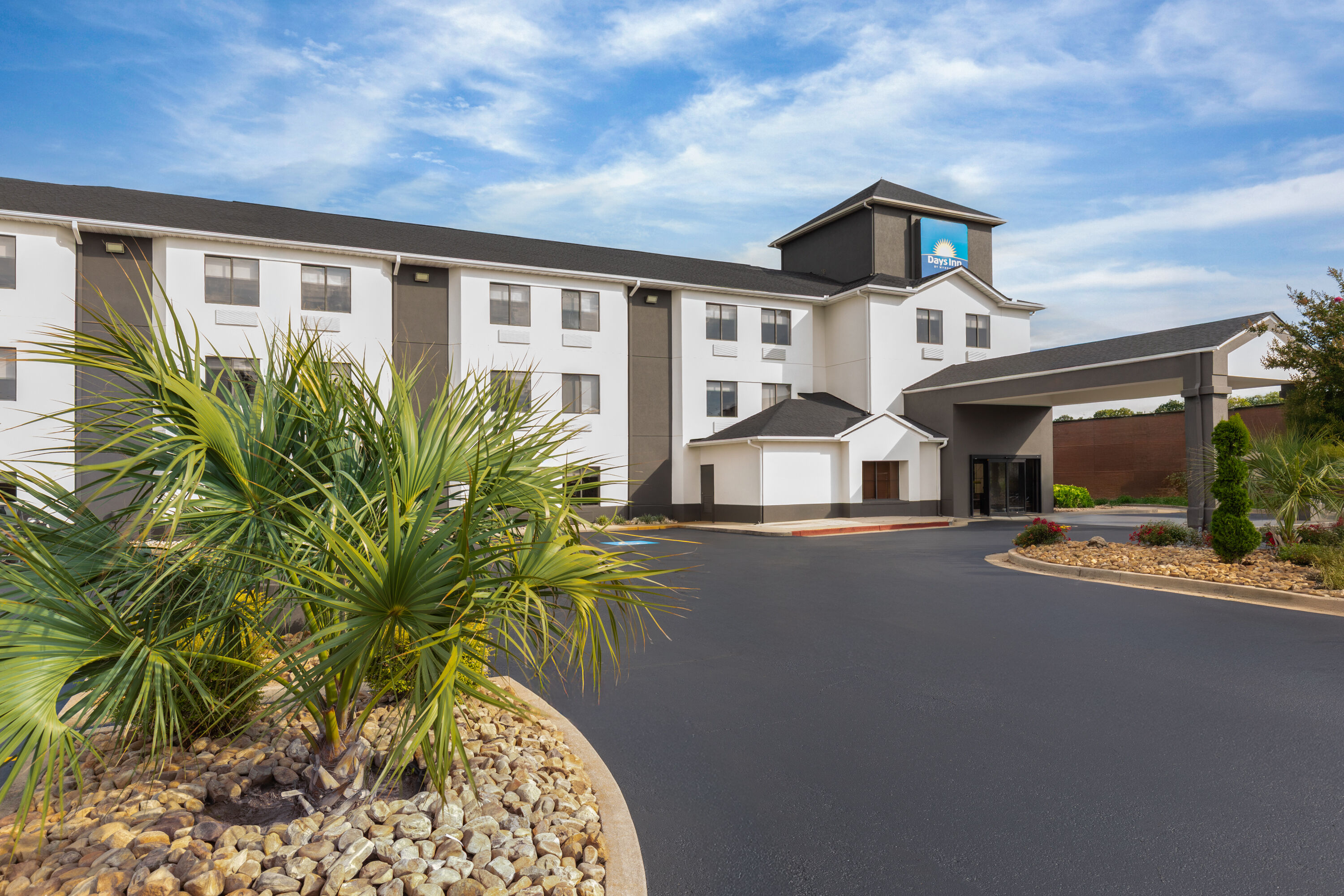 Exterior Day Image of Days Inn by Wyndham McDonough hotel in McDonough, Georgia