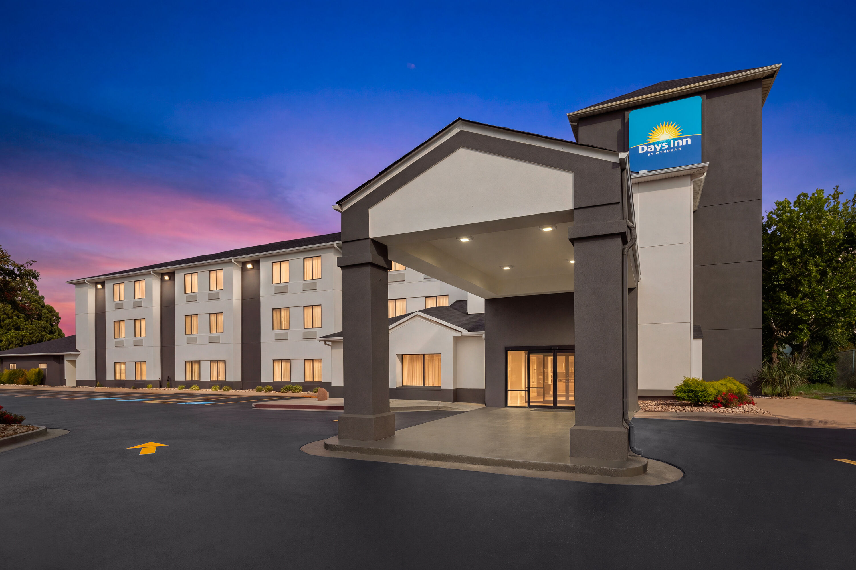 Exterior Dusk Image of Days Inn by Wyndham McDonough hotel in McDonough, Georgia
