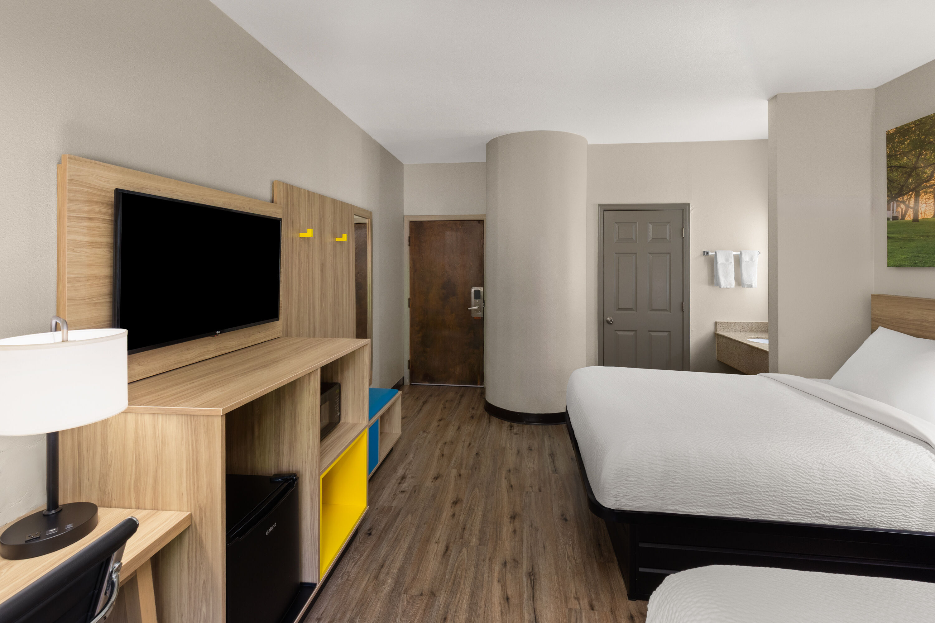 Guest room at the Days Inn by Wyndham McDonough in McDonough, Georgia