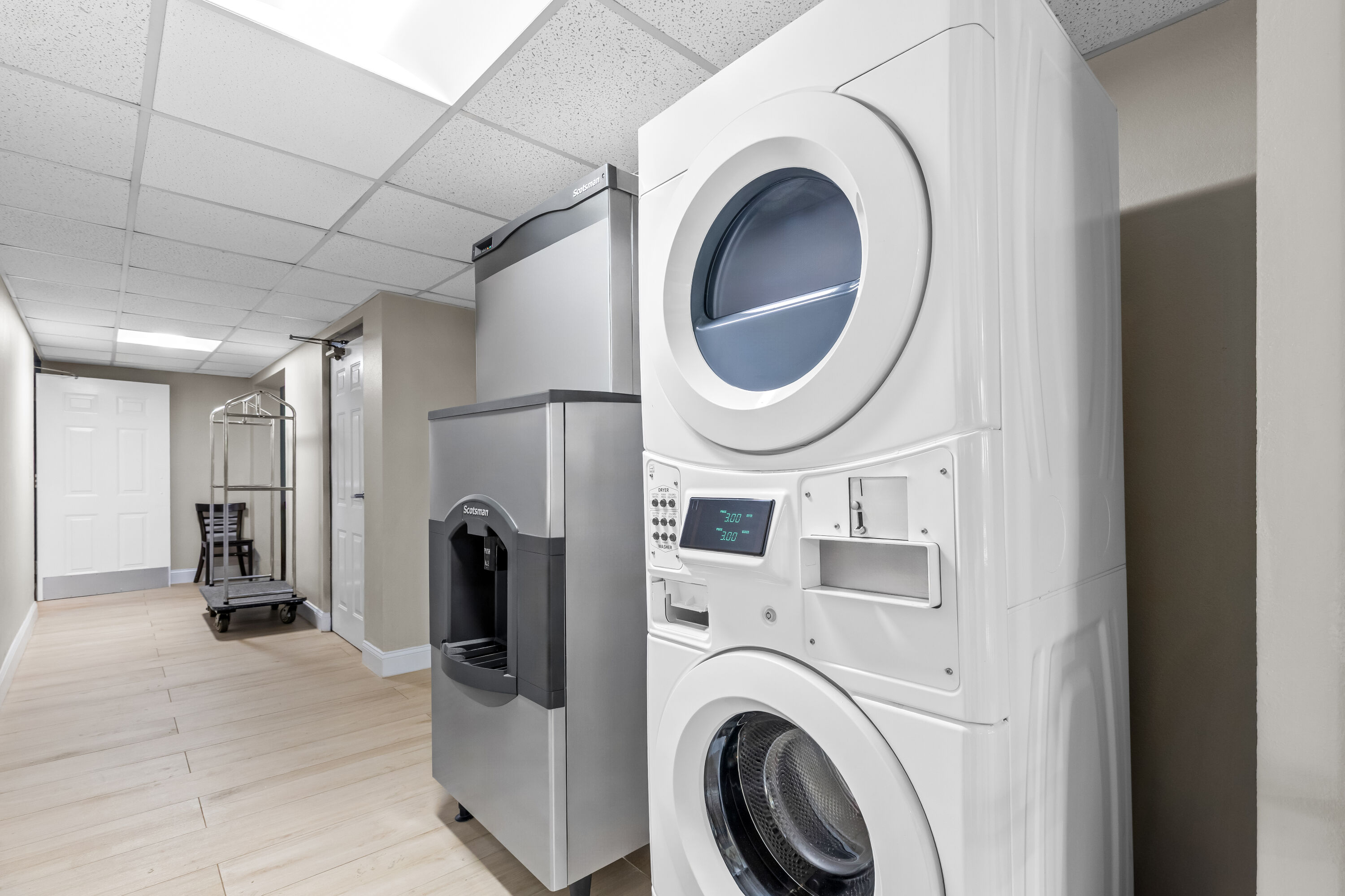 Laundry facilities at Days Inn & Suites by Wyndham Peachtree Corners/Norcross in Norcross, Georgia