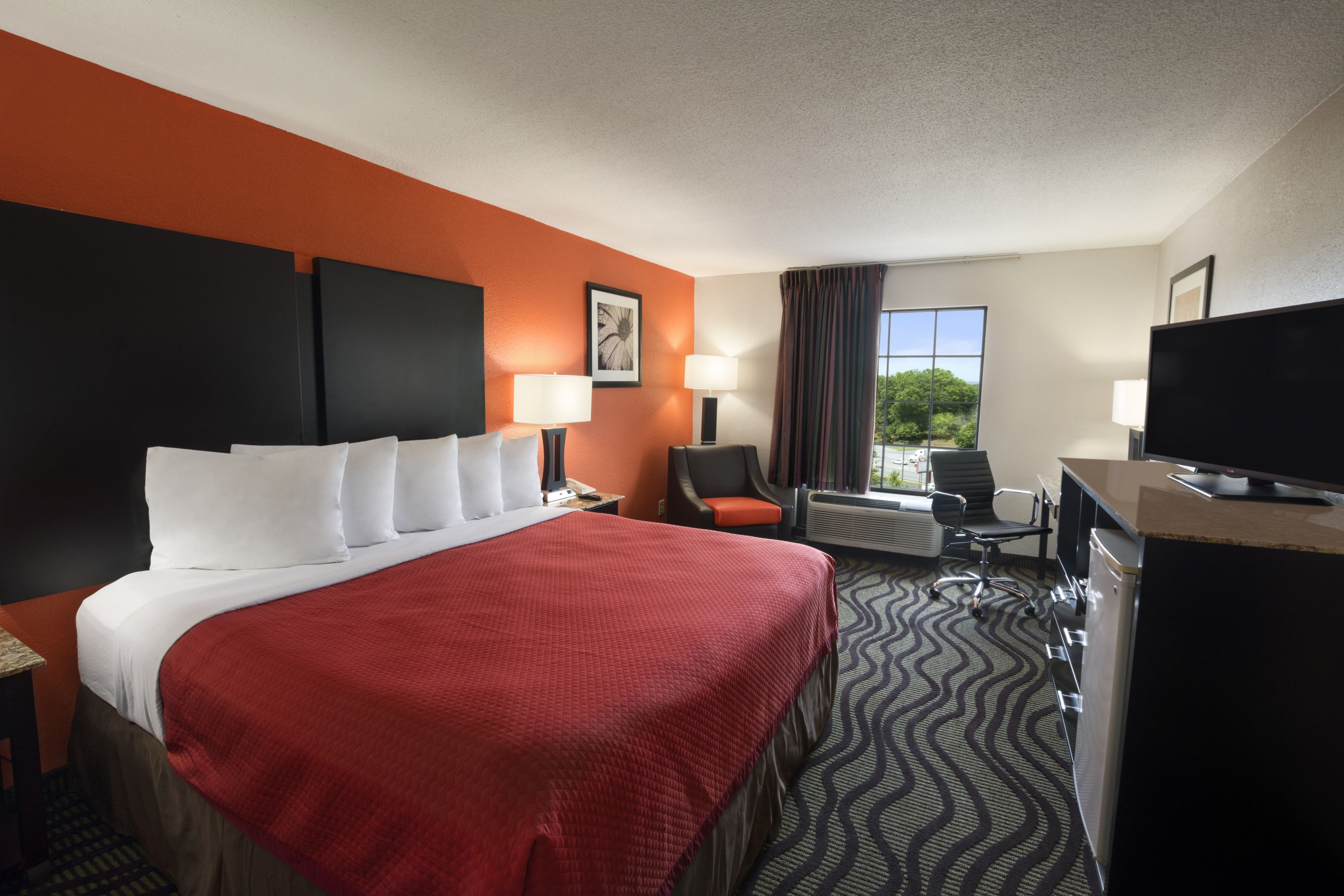 Guest room at the Days Inn by Wyndham Rome Downtown in Rome, Georgia