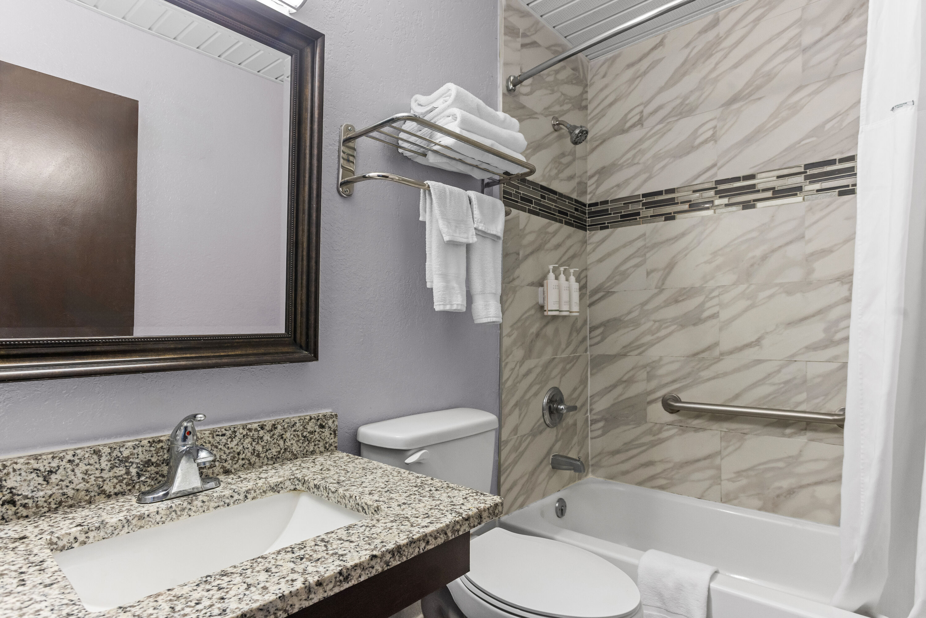 Guest room bath at the Days Inn by Wyndham Savannah Gateway I-95 in Savannah, Georgia