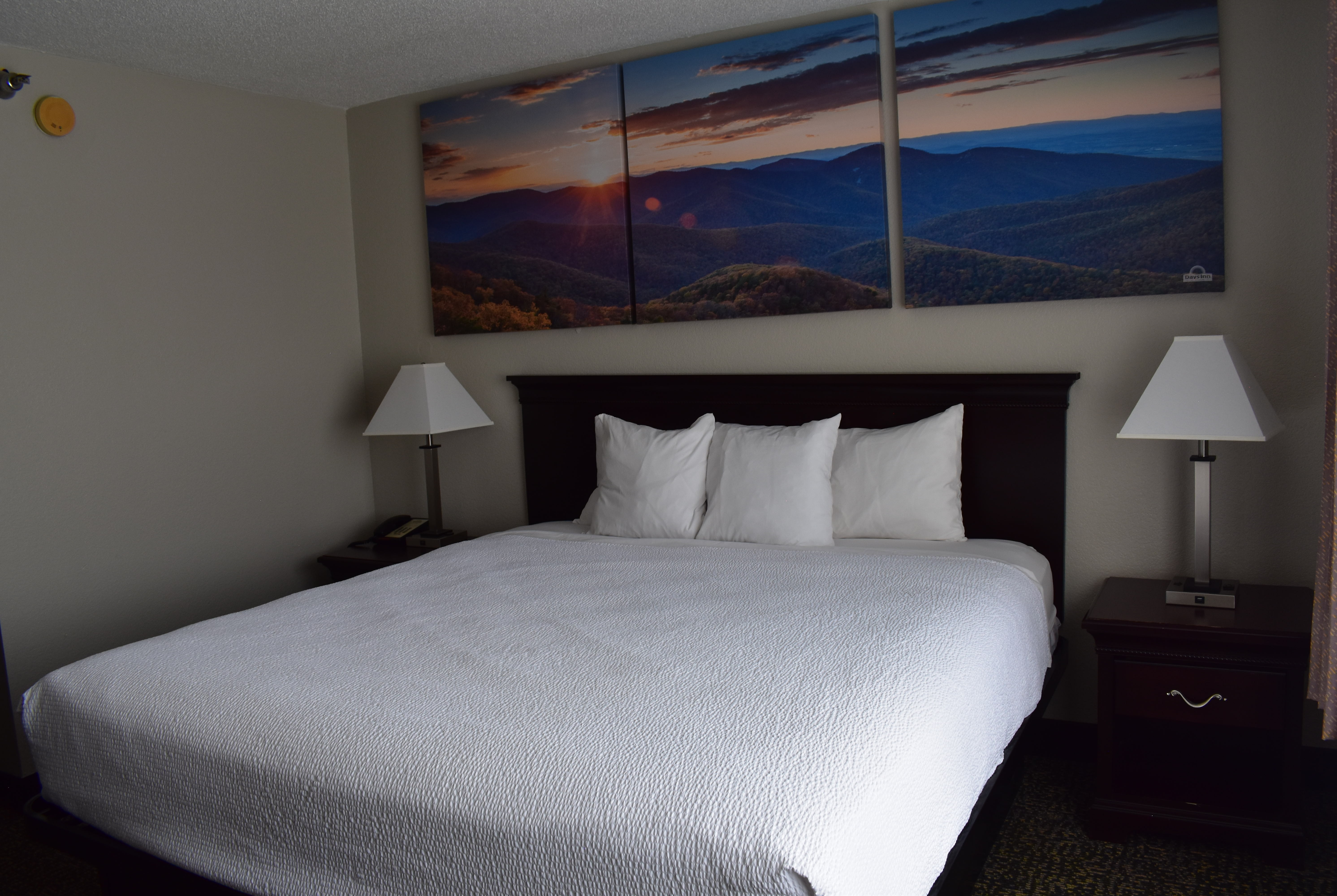 Guest room at the Days Inn & Suites by Wyndham Tucker/Northlake in Tucker, Georgia