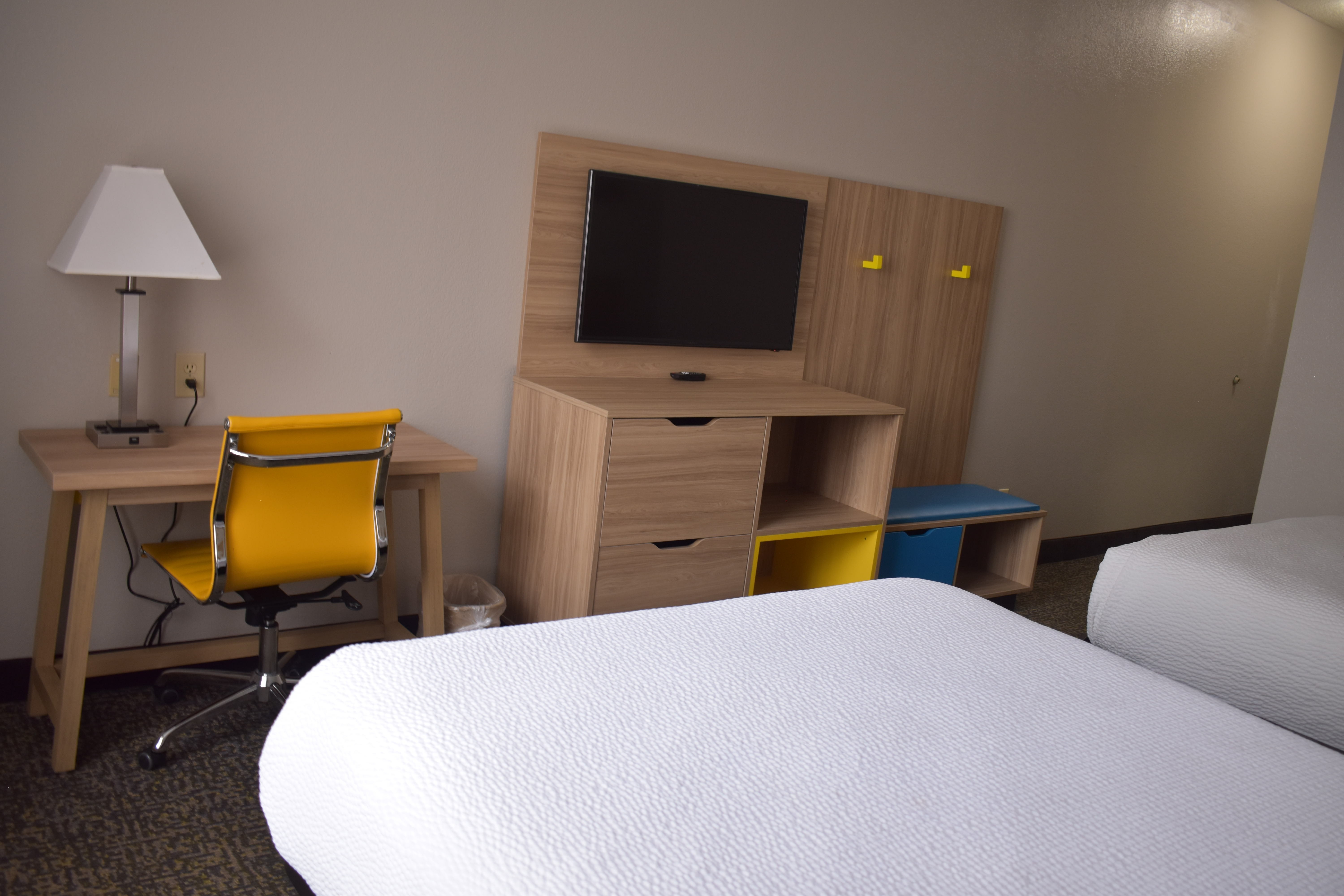 Guest room at the Days Inn & Suites by Wyndham Tucker/Northlake in Tucker, Georgia