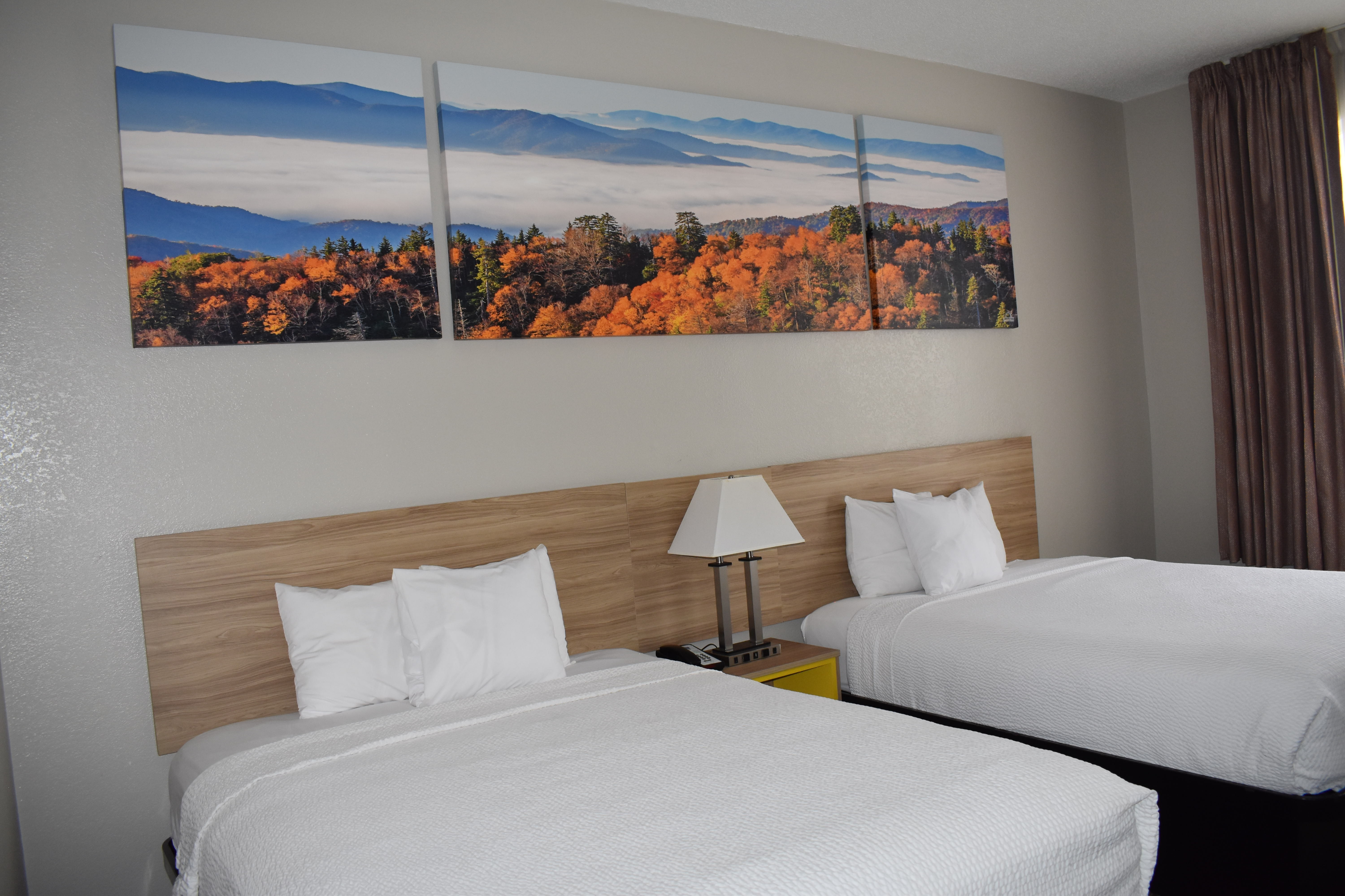 Guest room at the Days Inn & Suites by Wyndham Tucker/Northlake in Tucker, Georgia