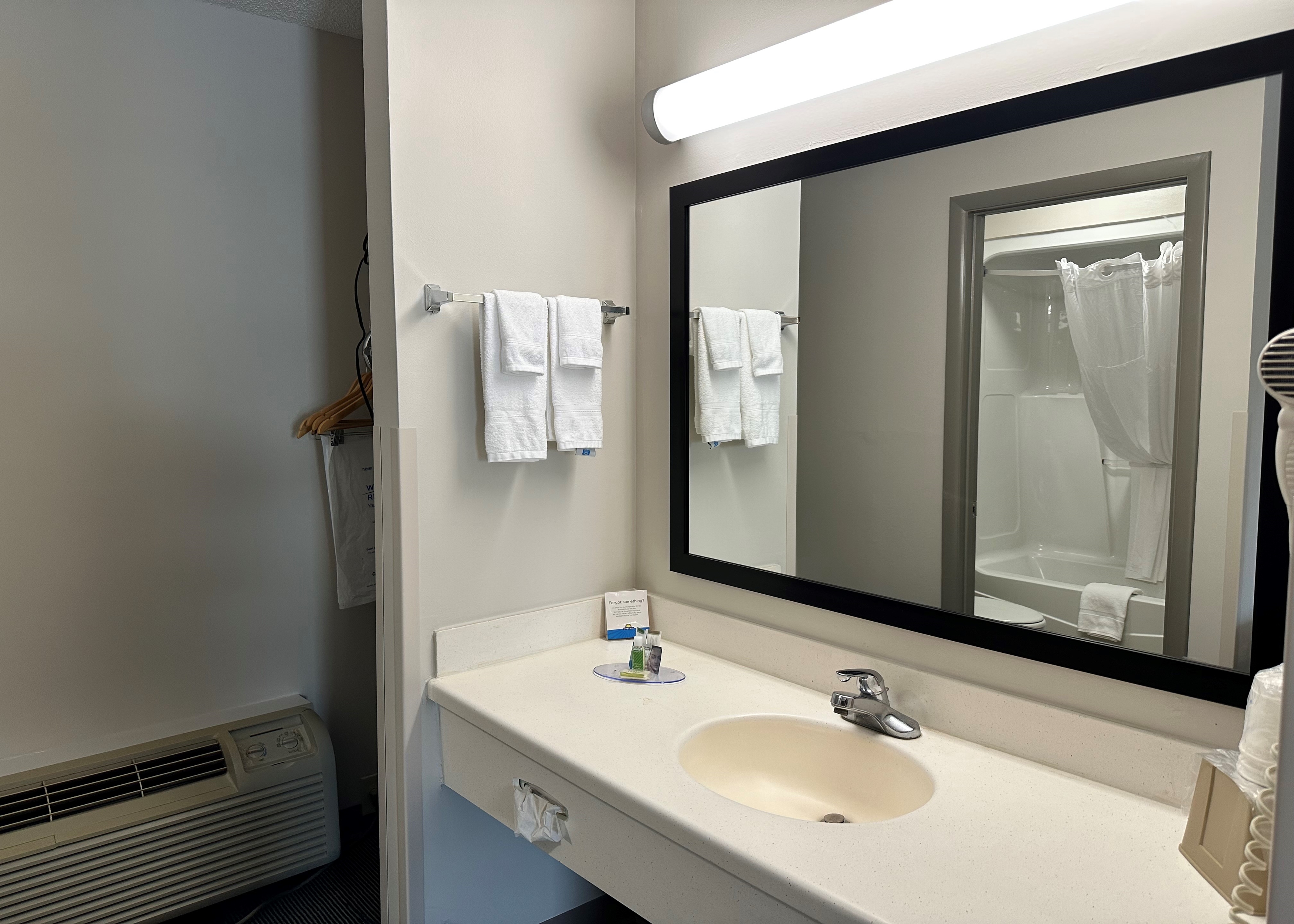 Guest room bath at the Days Inn by Wyndham Valdosta I-75 in Valdosta, Georgia