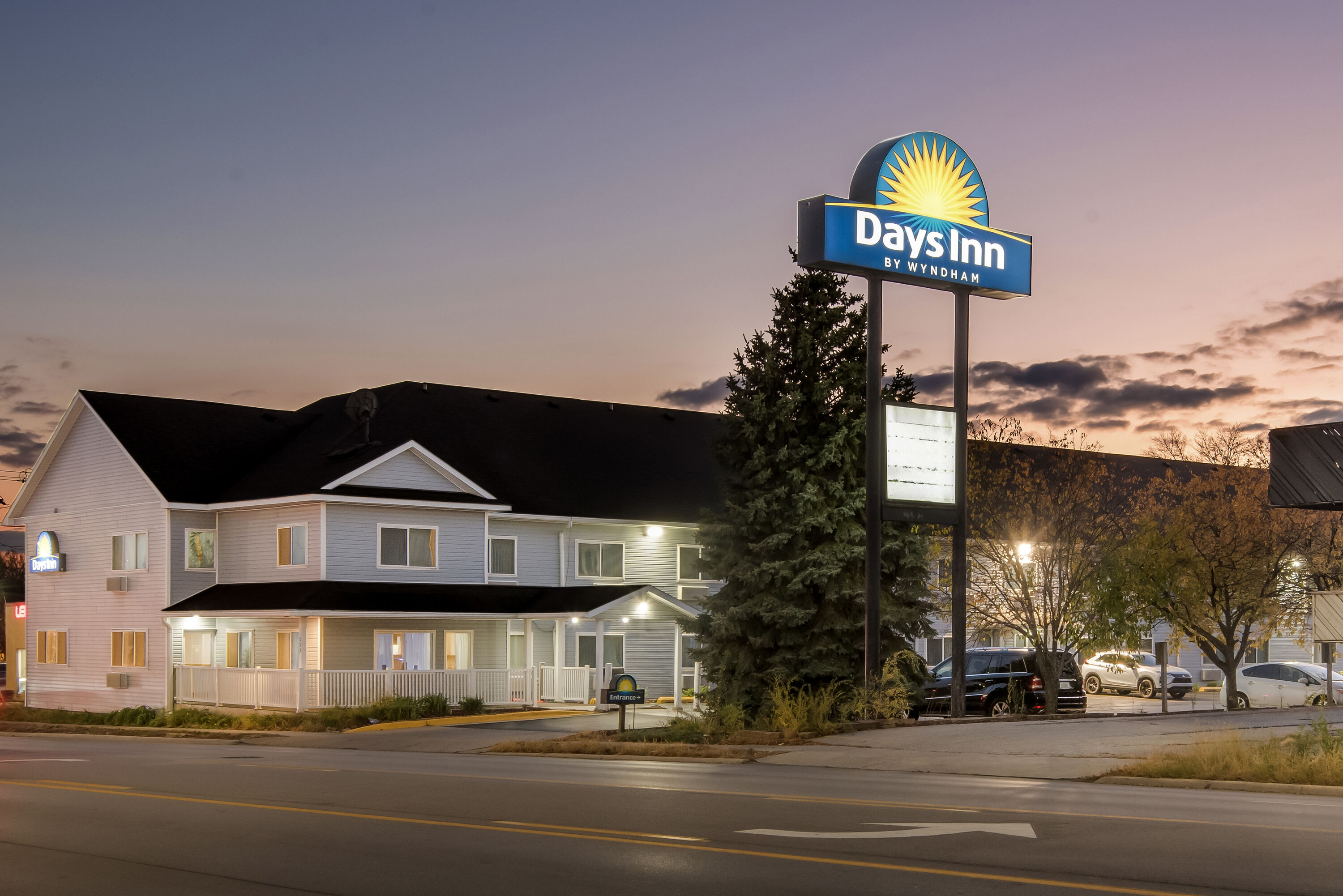 Exterior Night Image of Days Inn by Wyndham Ames hotel in Ames, Iowa