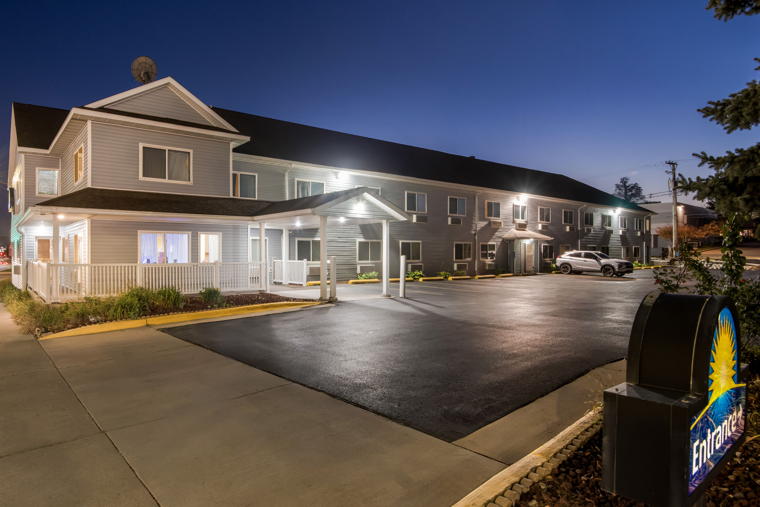 Exterior Night Image of Days Inn by Wyndham Ames hotel in Ames, Iowa